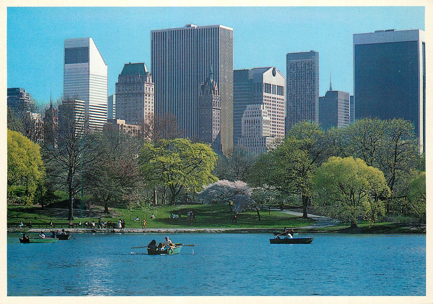 CPM Peaceful lake in central park with new york's midtown skyline in the background