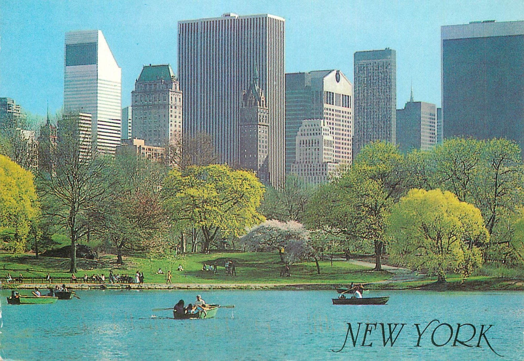 CPM New york peaseful lake in central park with New york's midtown skyline in the background