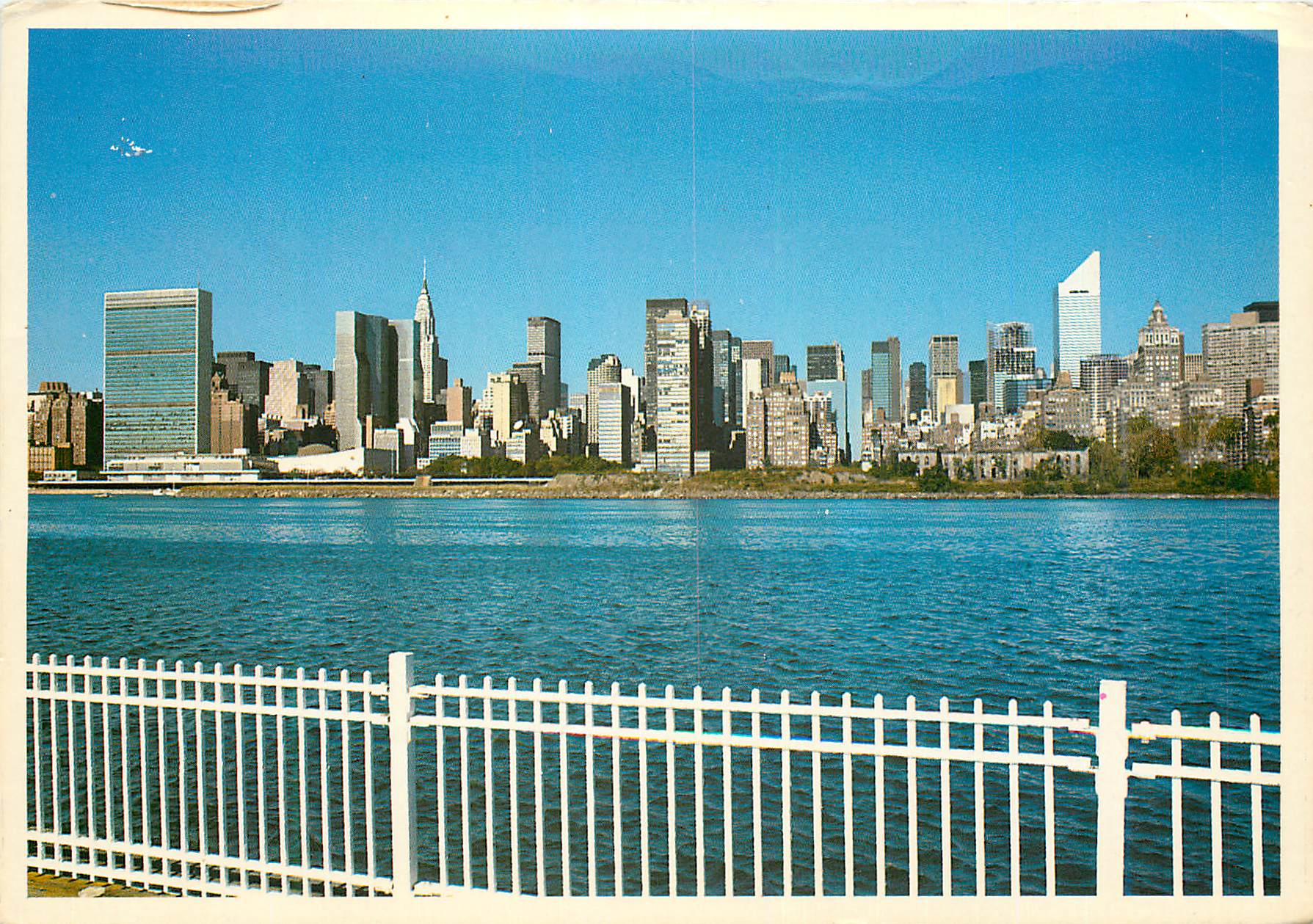CPM New york city the east river and midtown skyline as seen from queens