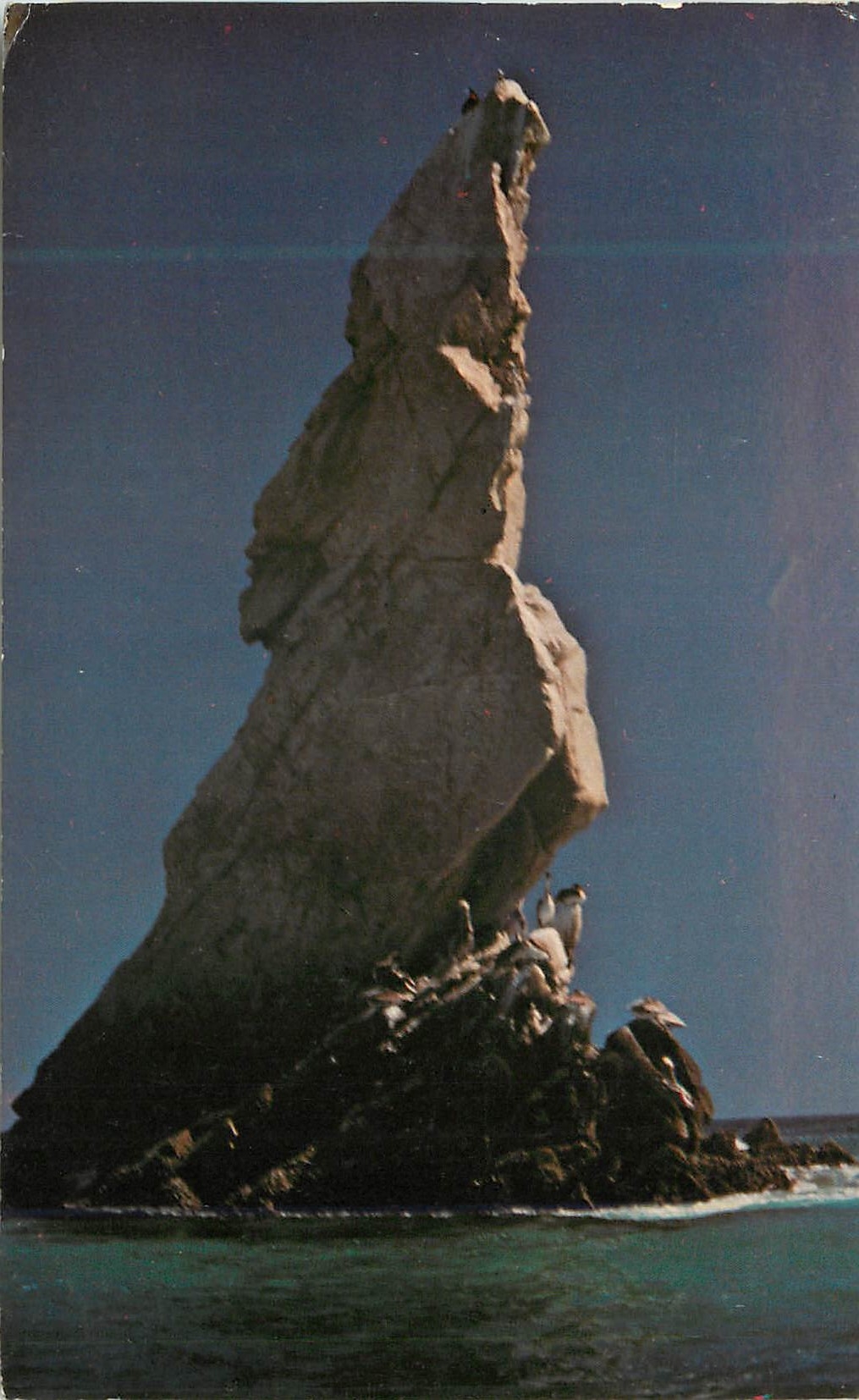 CPM Chess Bishop an interesting rocky formation that seems to emerge from the bottom of the sea and-point up like an Oly