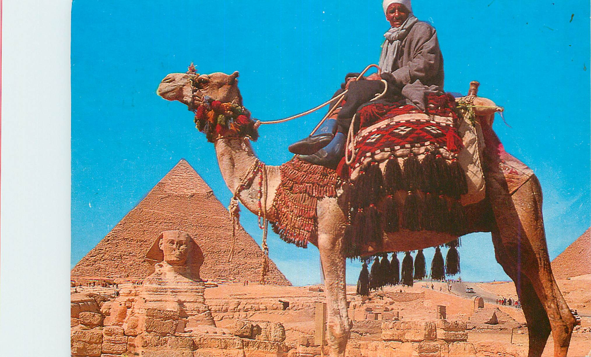 CPM Giza Camel driver near the Sphinx and Khafre Pyramid
