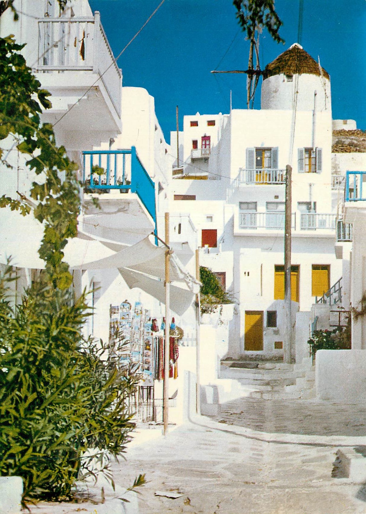 CPM Myconos At the picturesques narroews of the island