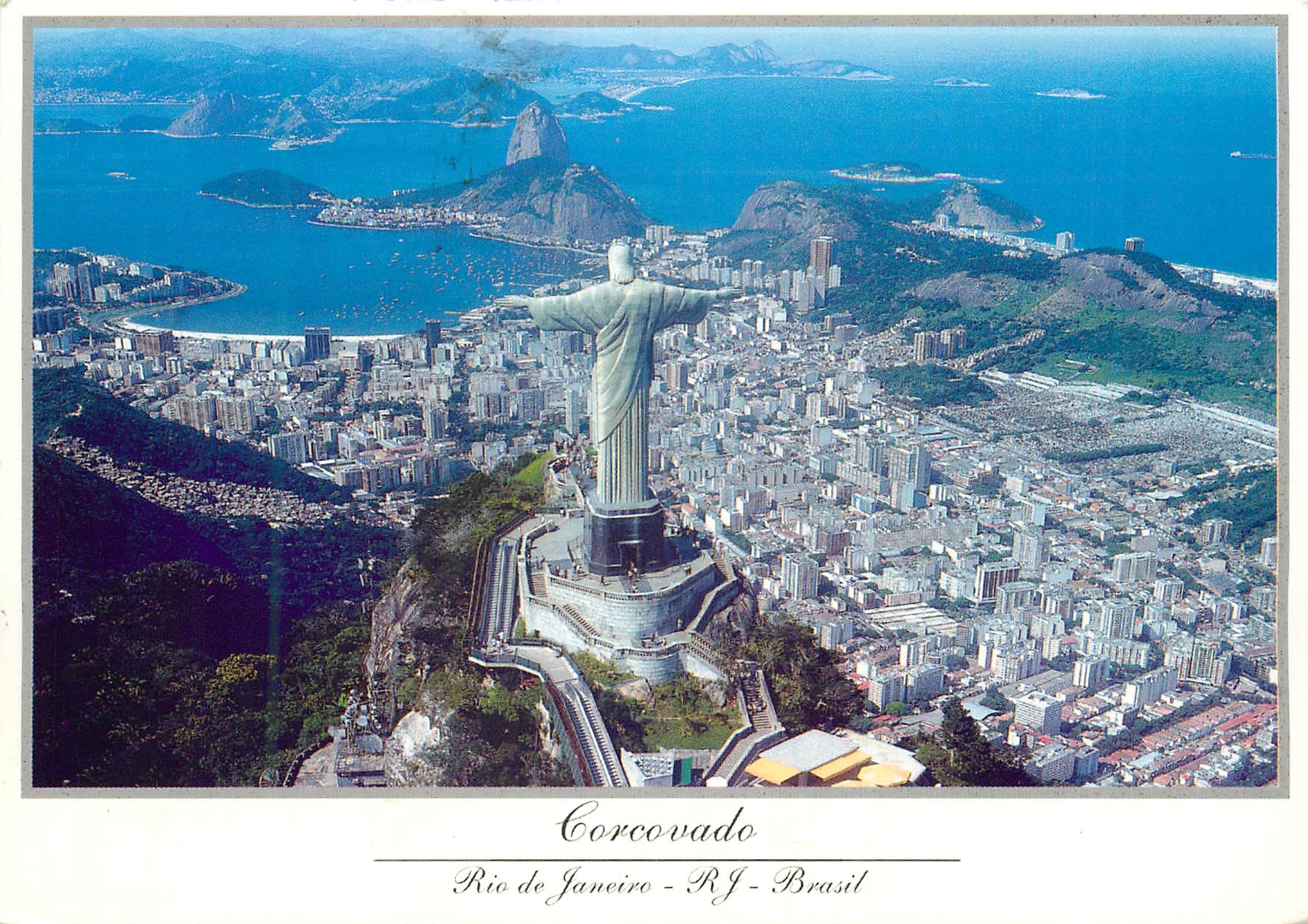 CPM Brasil Turistico Rio de Janeiro Brasil Air view of the Corcovado Rock with Sugar Loaf on the background 