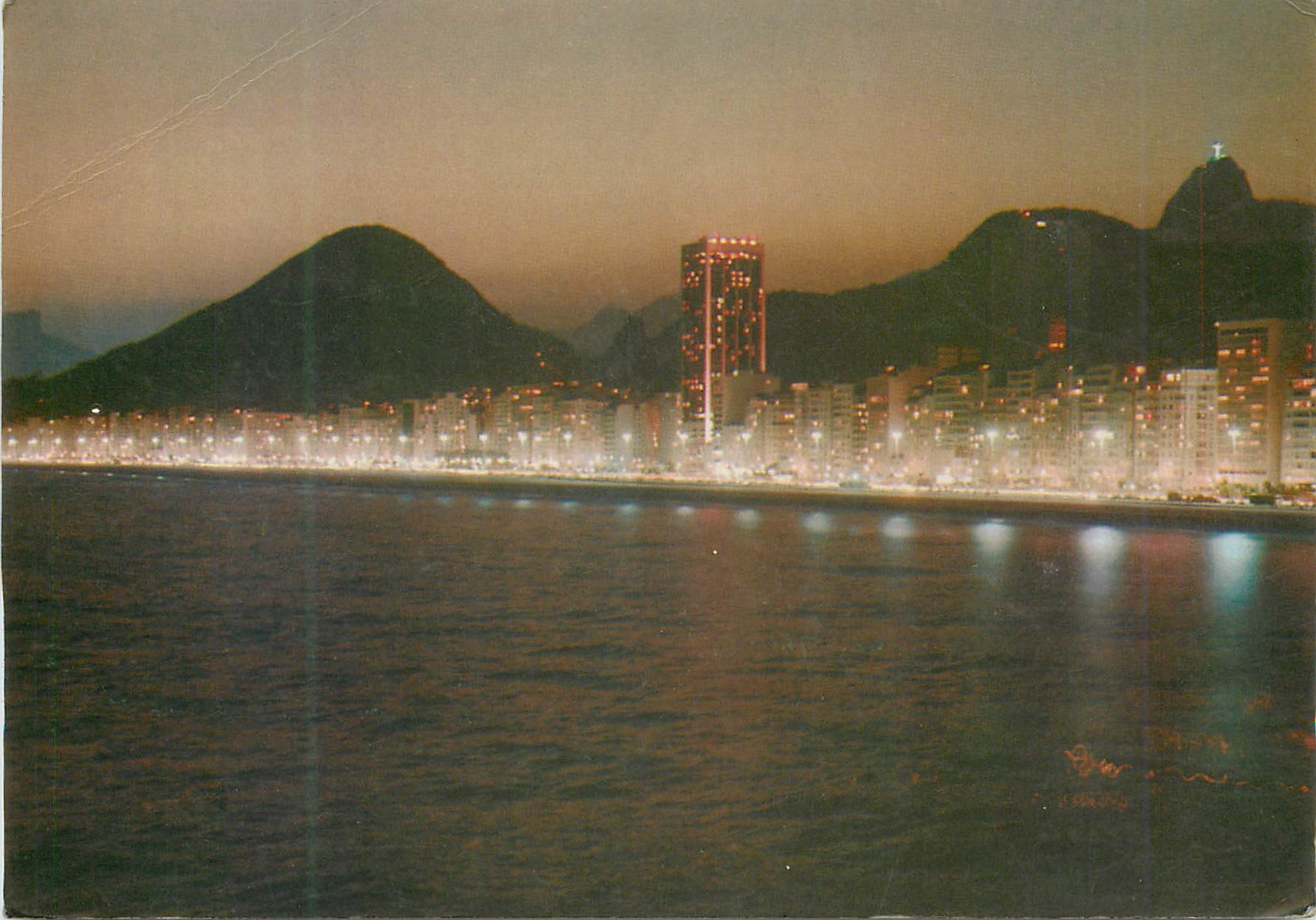 Rio de Janeiro — Copacabana Beach by night, Corcovado rock in background — BRASIL TURÍSTICO, n°21