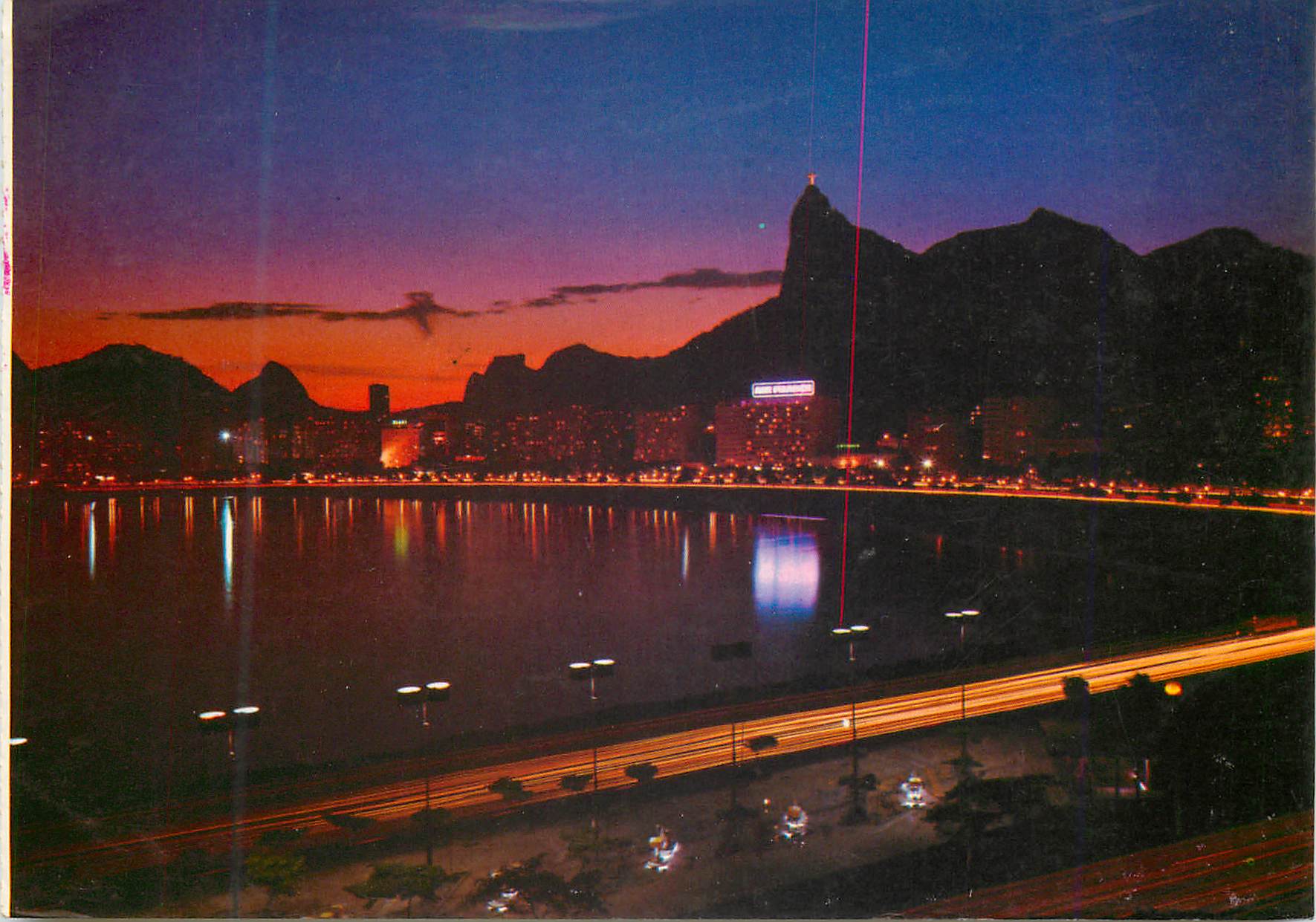 CPM Brasil Turistico Rio de Janeiro Night view of Botafogo Bay with Christ the Redeemer 
