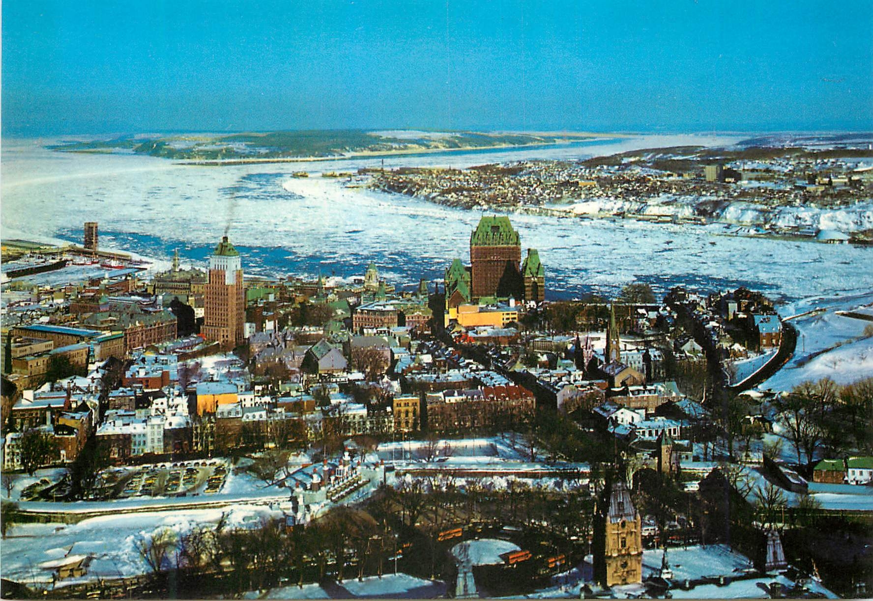CPM Quebec Une vue partielle de Quebec de la pointe de Levis et de l'Ile d'Orleans en Hiver 