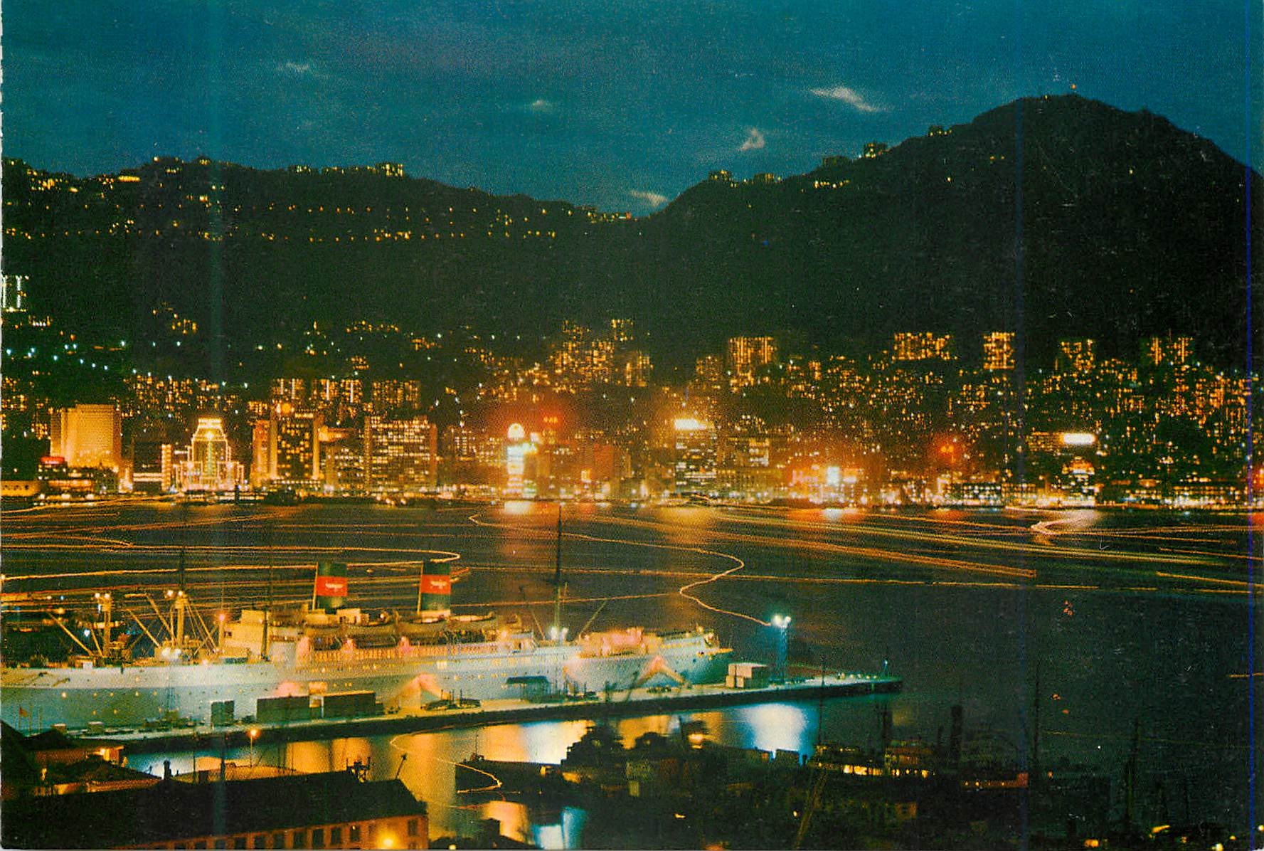 CPM Hong Kong by night overlooking from Kowloon