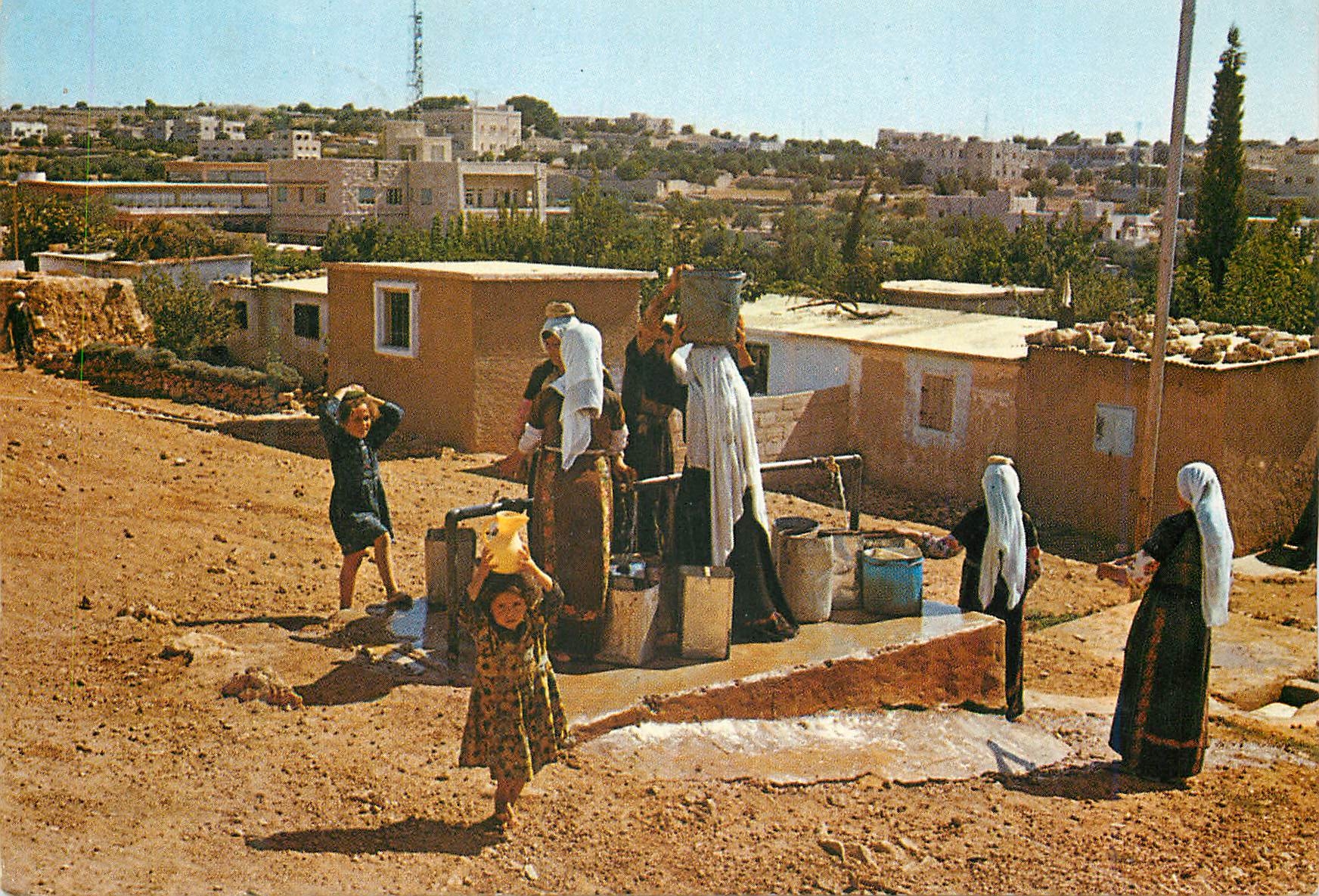 CPM Arab women drawing water