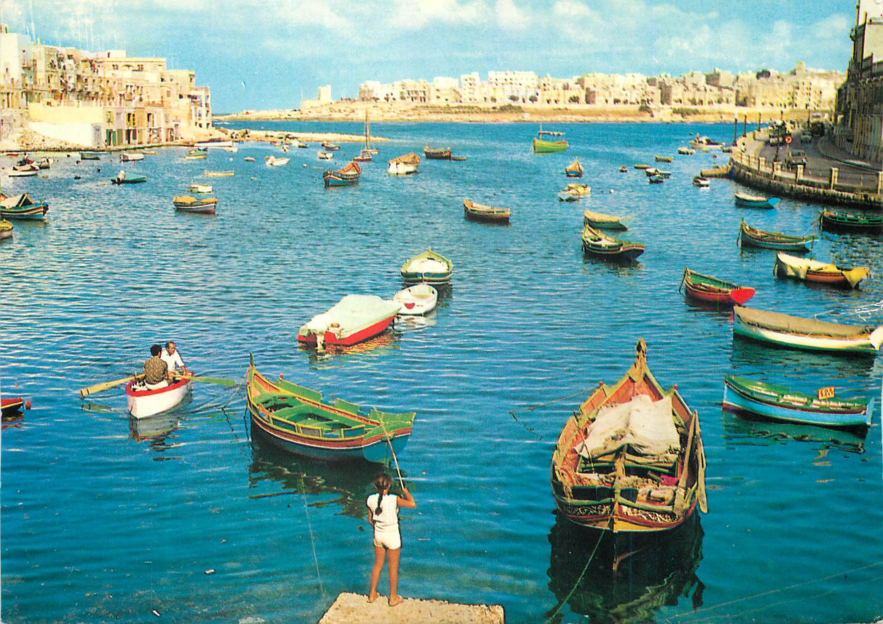 CPM St Julians is a picturesque creek thronged with colourful fishing boats 