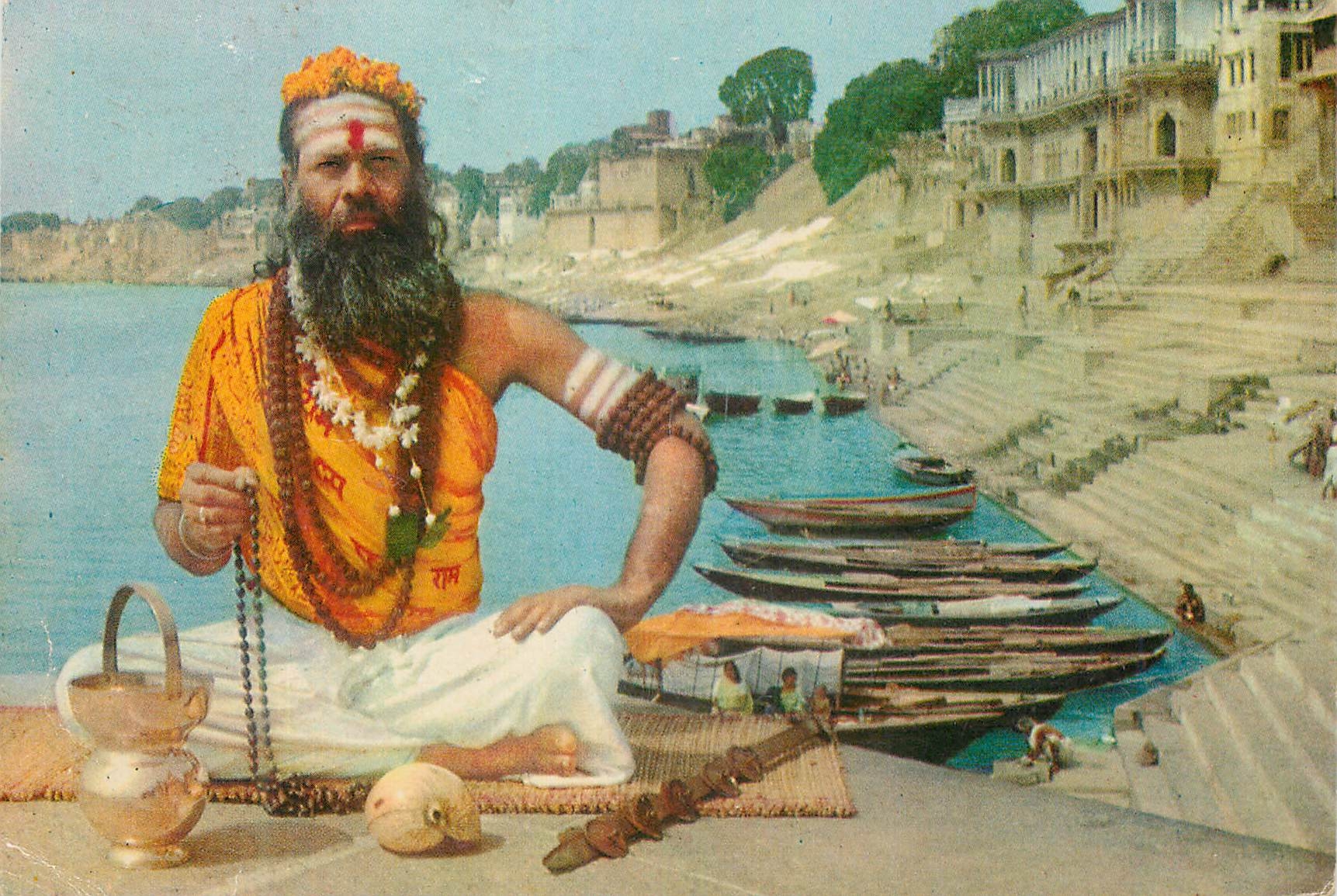 CPM A saint in meditation by the river side Varanasi India 