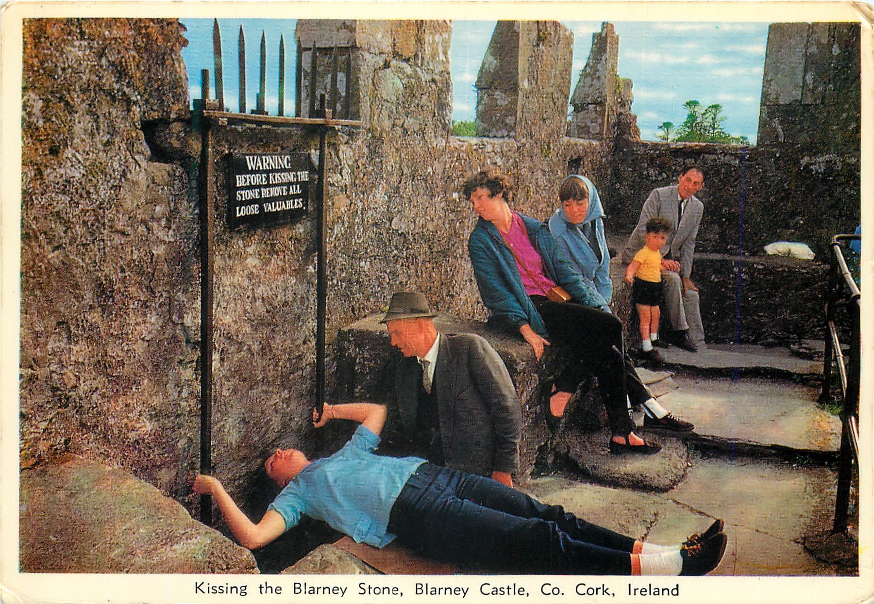 Kissing the Blarney Stone, Blarney Castle, Co. Cork, Ireland — Published by Cardall Ltd., Dublin