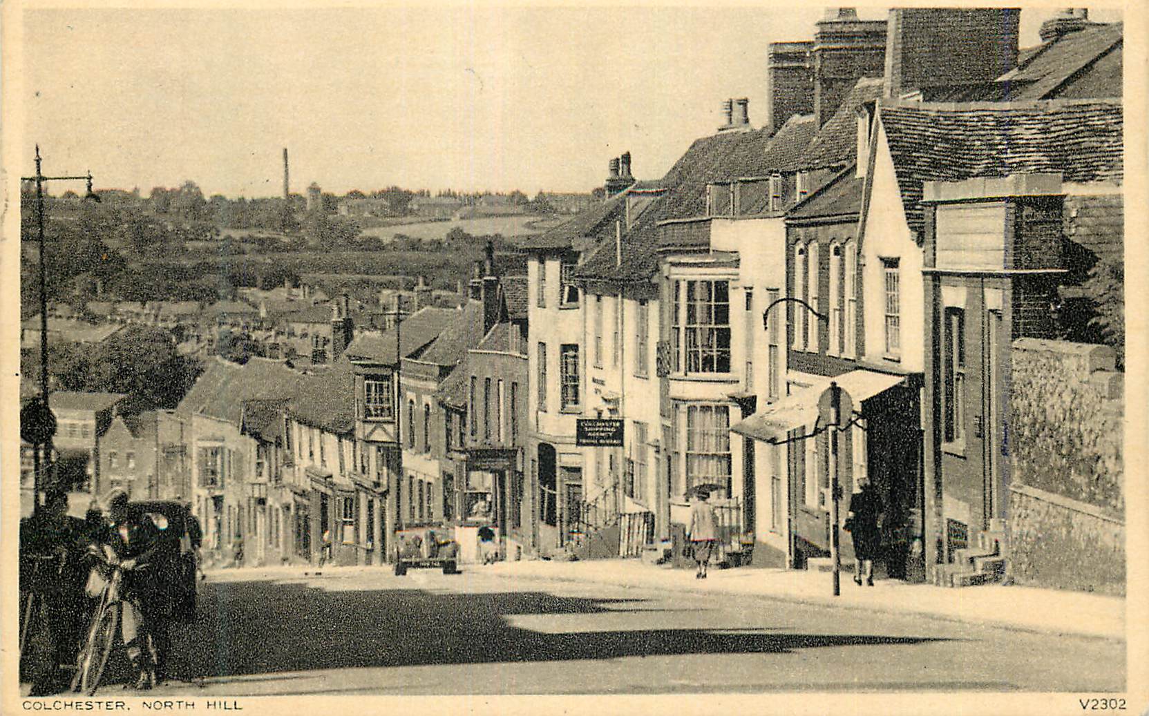 Colchester, North Hill — vue de rue avec bâtiments et voiture — Photochrom Co. Ltd., Kent, n° V2302