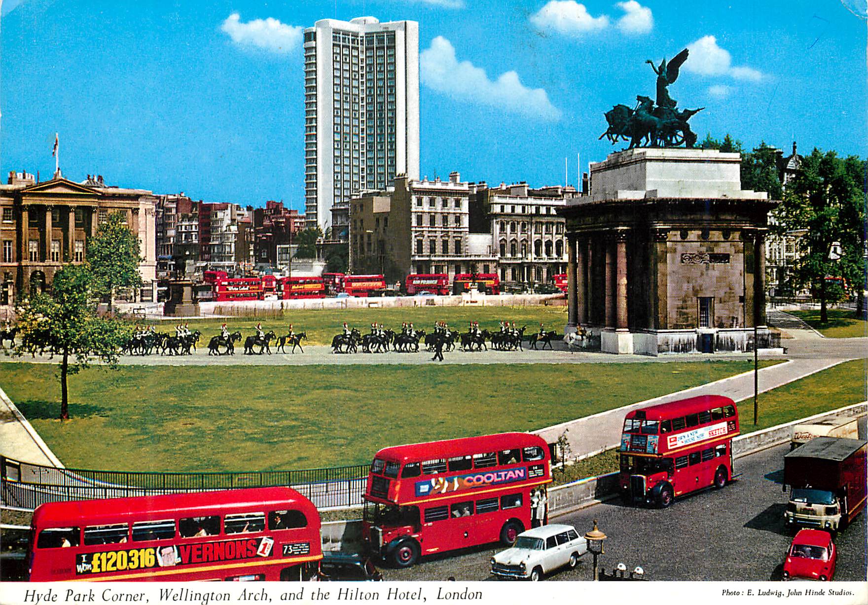 CPM Hyde Park Corner Wellington Arch and the Hilton Hotel London Autobus
