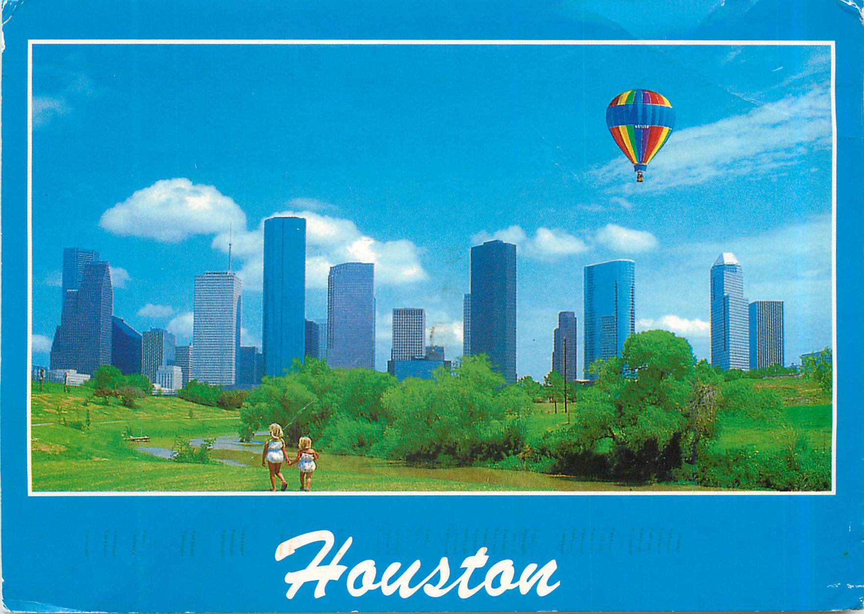 CPM Houston A Colorful Balloon Adds Special Beauty to Houston's Superb Skyline and to a Childes Joyous Delight Mongolfie