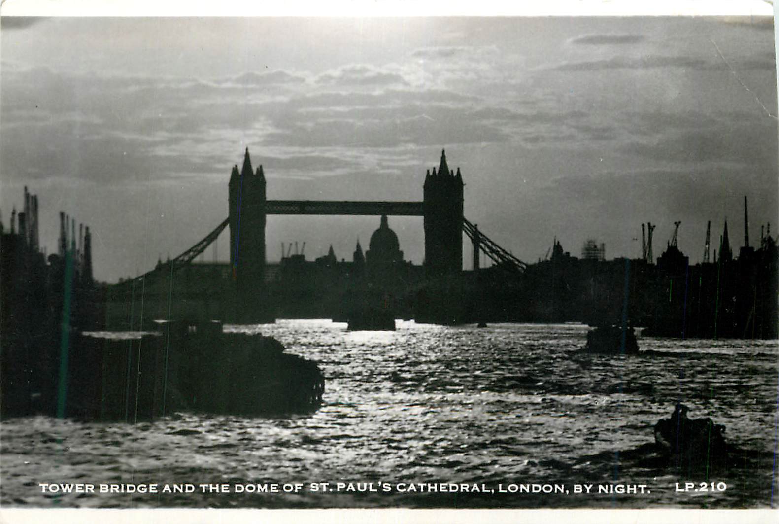 CPM Tower Bridge and the Dome of St Pauls Cathedral London by night 