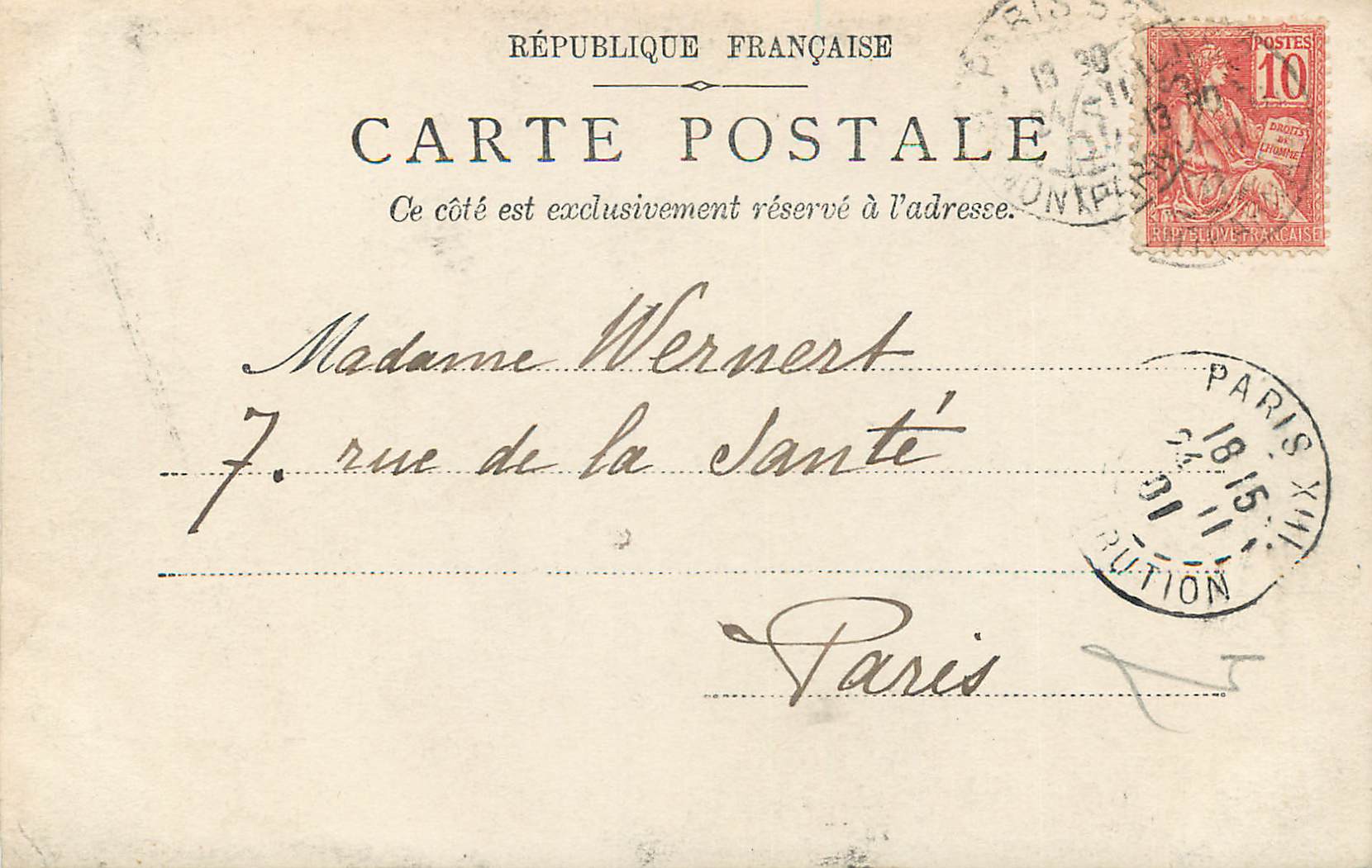 Paris — Photographie d'une femme et d'un enfant — Carte postale française — Verso