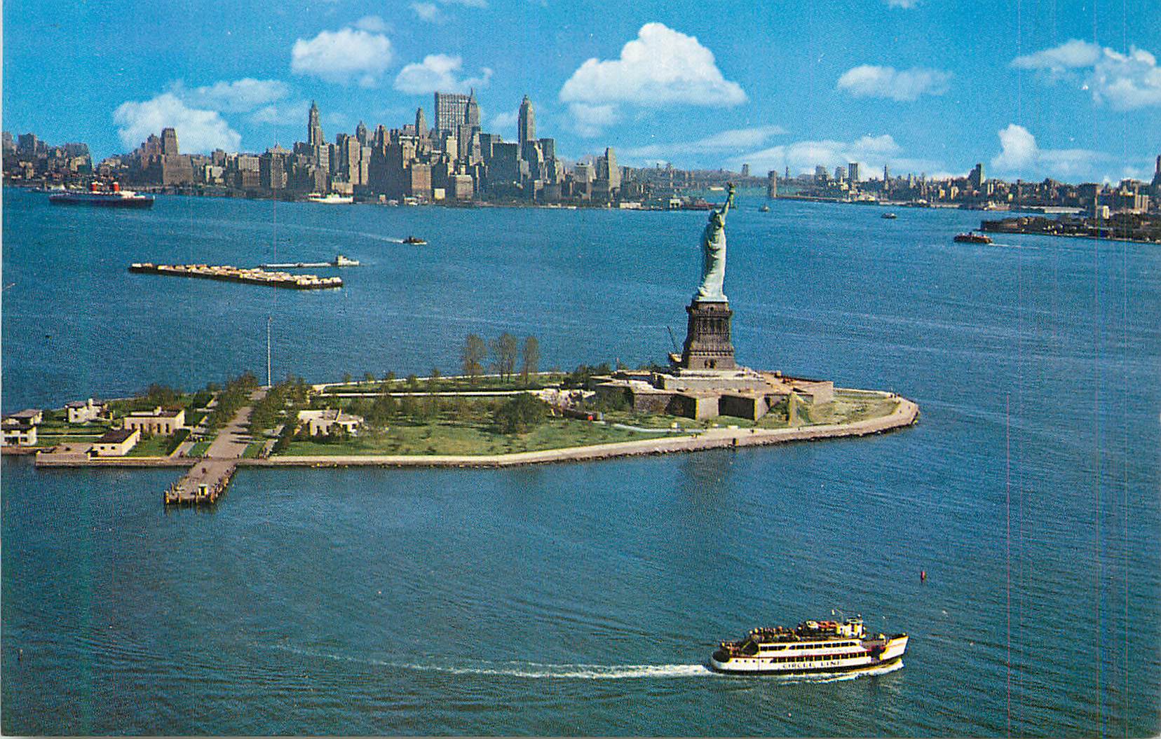 CPM 437 lower new york harbor showing the statue of liberty and new york skyline in the background