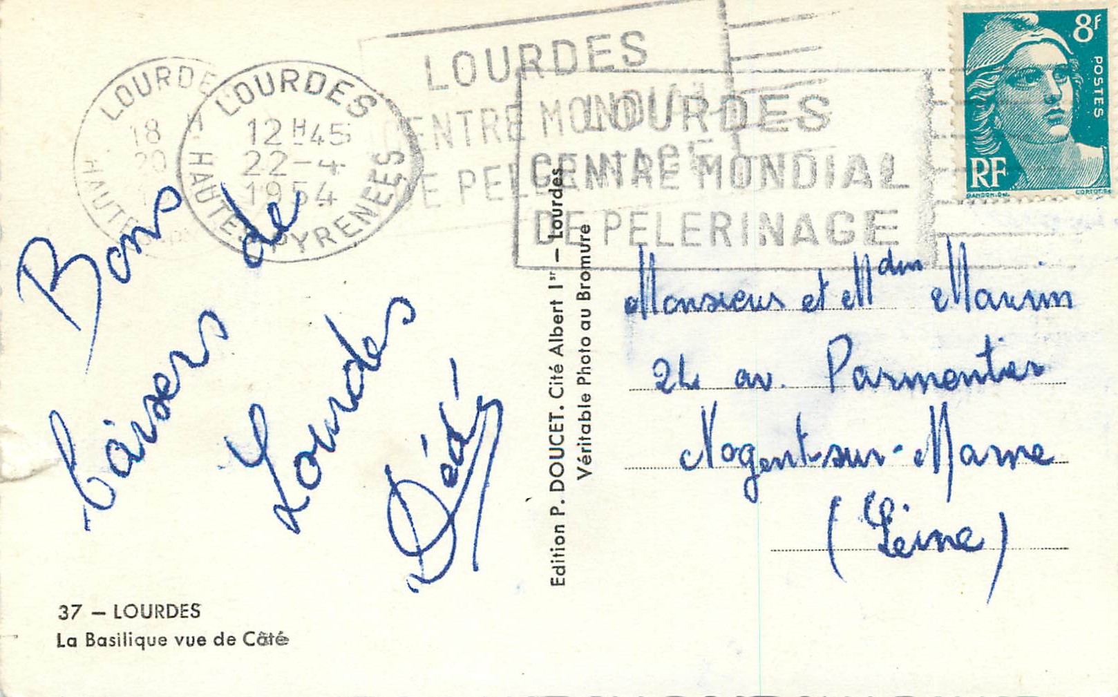 CPM Lourdes La Basilique vue de Cote — Verso