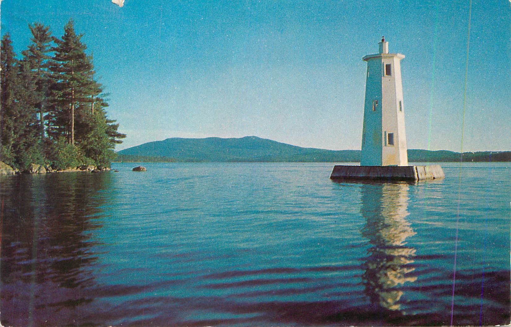 CPM Lakeside Lighthouse With Mt Sunapeer in the Distance Across lake Sunapee N H