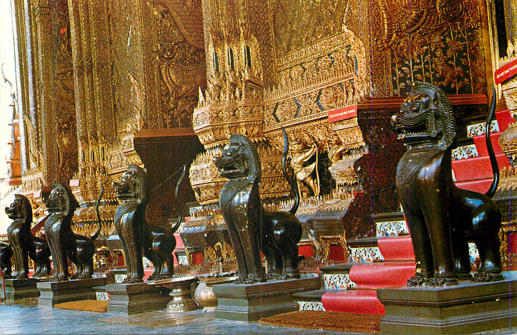 CPM Many Brass Lions infront the Designs outside the Wat temple Phra Keo Bangkok Thailand 