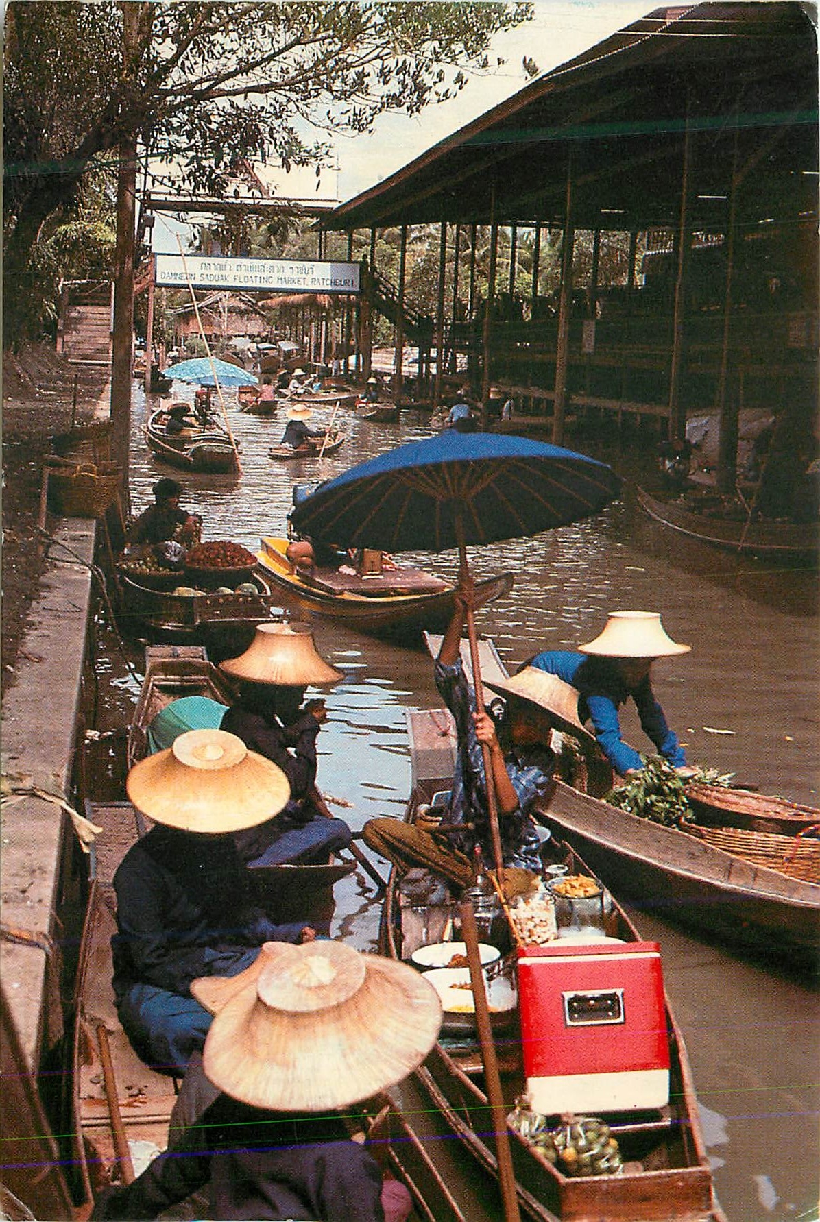 CPM Boat Vendors Plying Along a Klong Part ot the Floating Market Scene at Damnoen Saduak