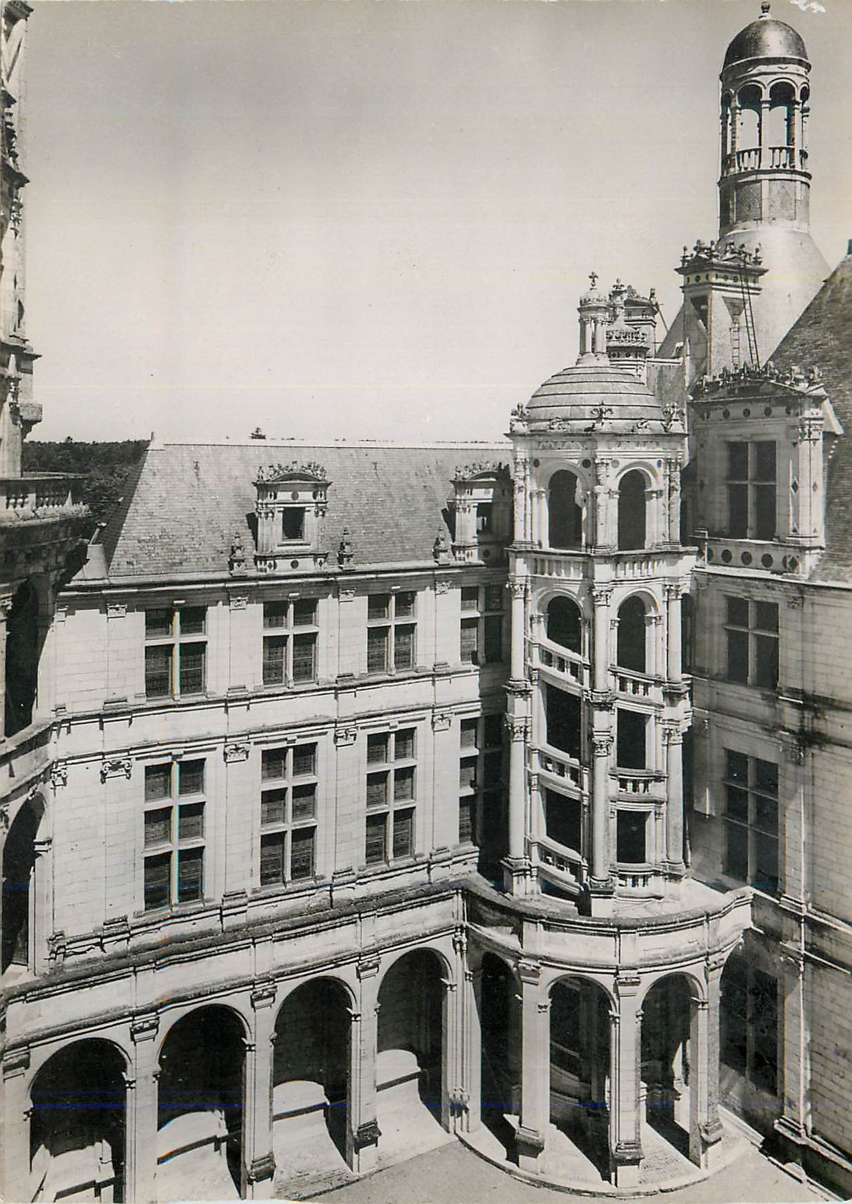 Chambord (Loir-et-Cher) — The Castle (1519-1550 approximately) — The François Ier Staircase (Northeast Corner of the Inner Courtyard) — Serv. Commercial Monuments Historiques, G. Palais, Av. Alexandre-III, Paris