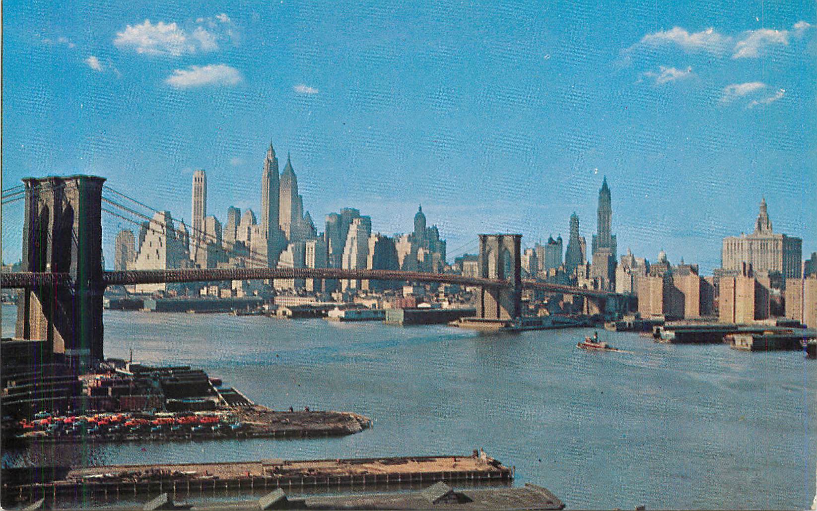 CPM Lower manhattan skyline showing brooklyn bridge new york city