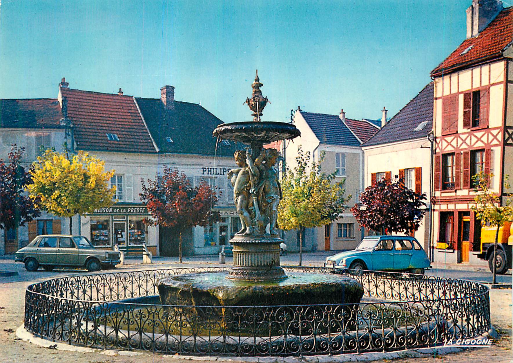 La Cigogne — La place du Marché, la fontaine — Éditions La Cigogne