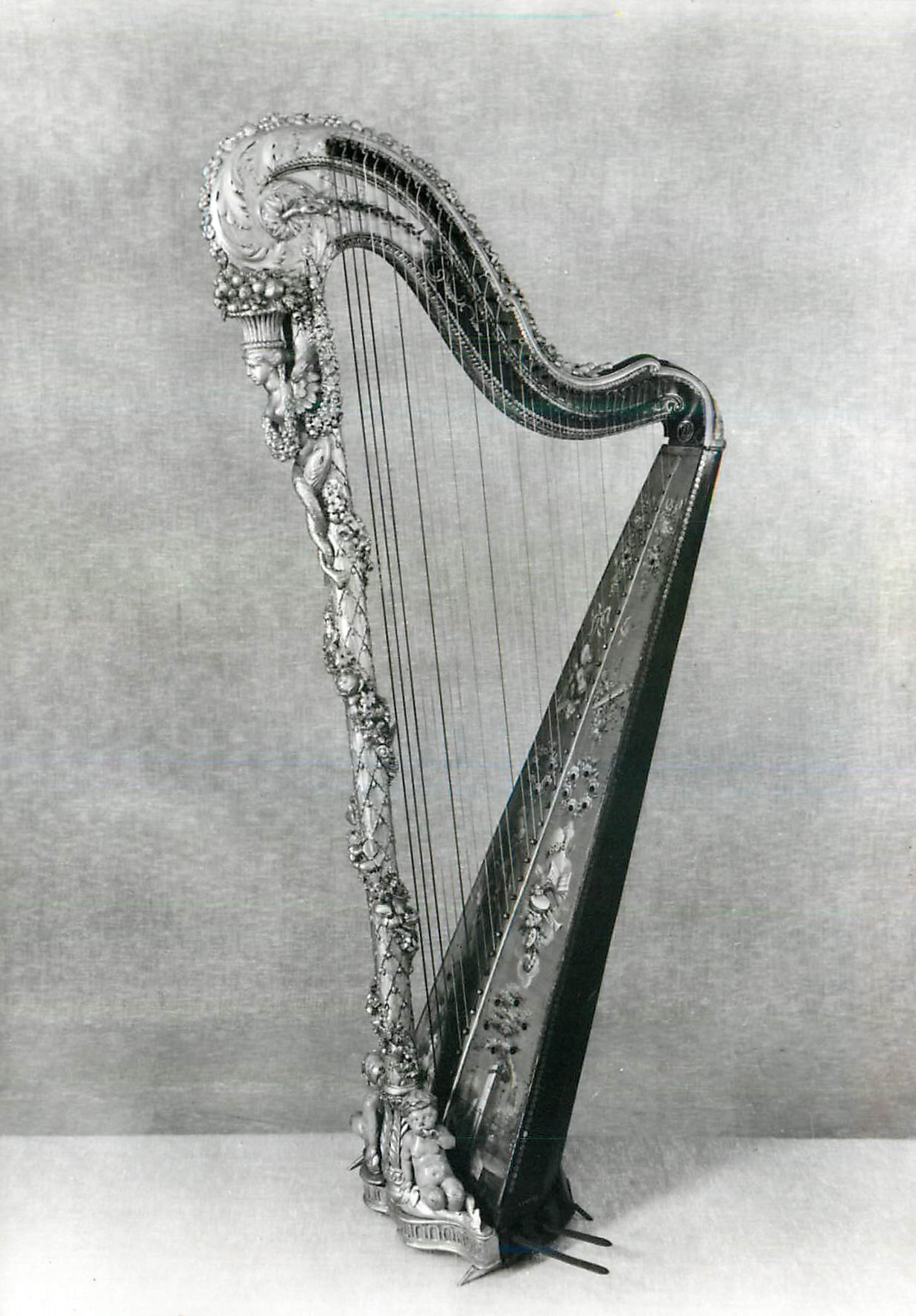 CPM Pedal Harp Pine belly painted with swags of flowers and trophies Victoria and Albert Museum 