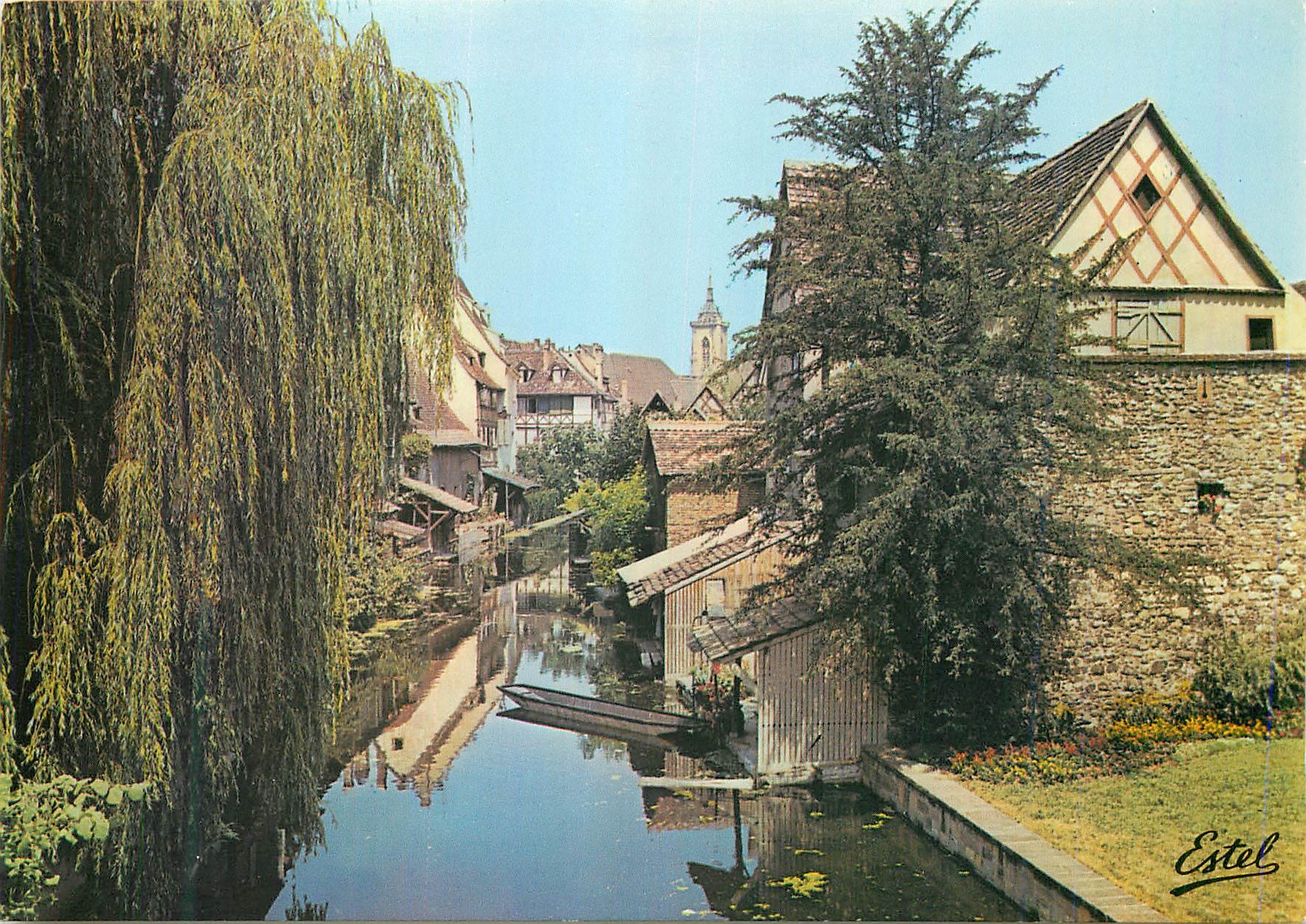 CPM Colmar (Haut Rhin) Au Pays des Cigognes Vue sur la Lauch au fond le Clocher de l'Eglise Saint Martin