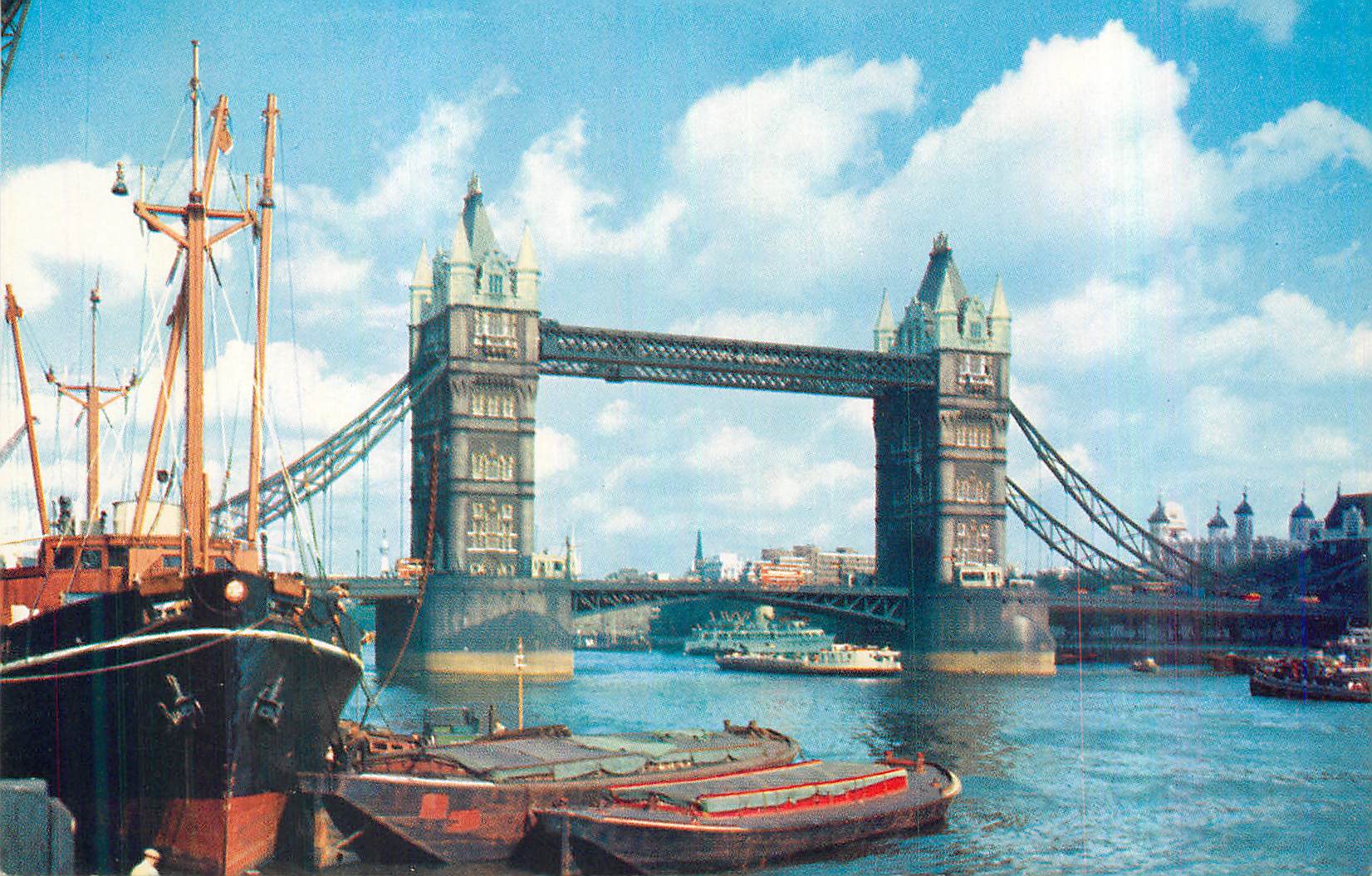 CPM England Tower bridge over the Thames River with the Tower of London 