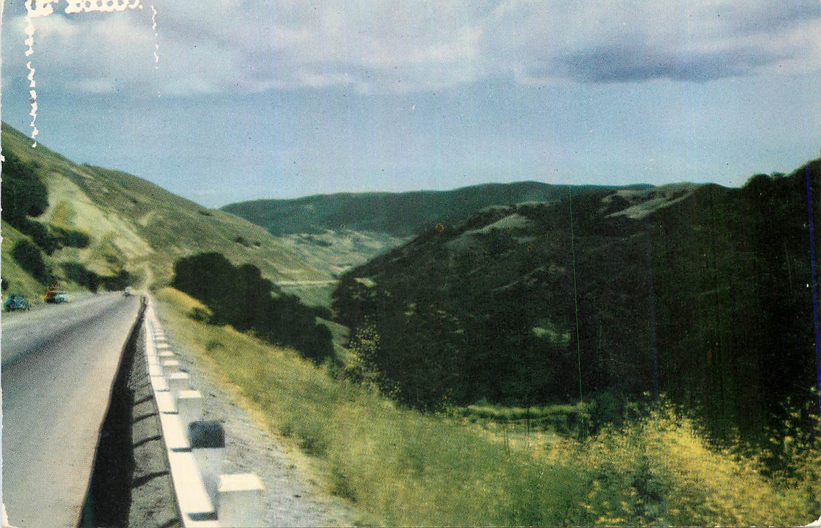 CPM US Highway twists up the wooded slopes of the Santa Lucia Mountains to Cuesta Pass 