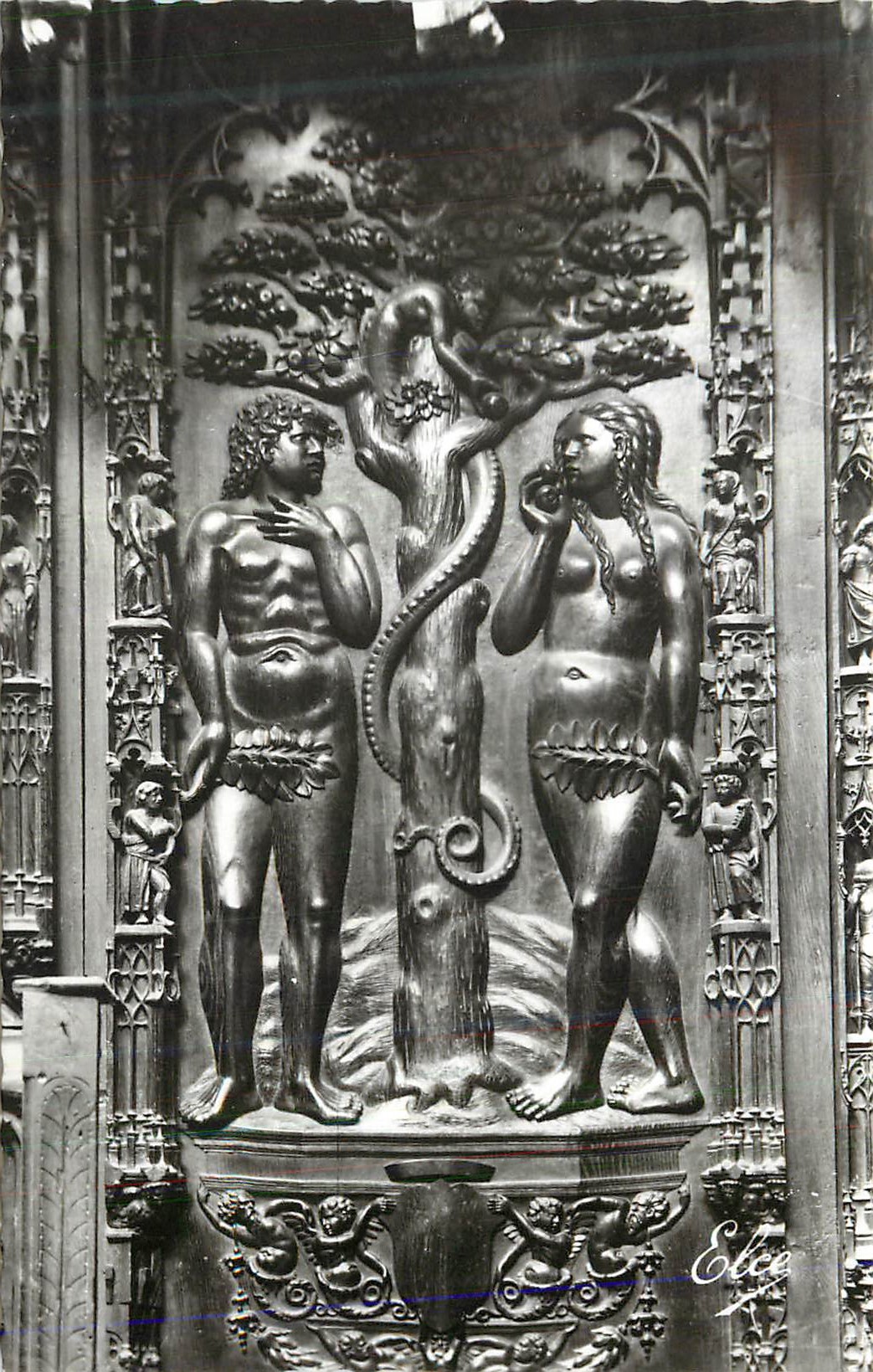 Adam et Ève au pied de l'arbre de la connaissance — sculpture en bois — Éditeur 'Eleg' (signature)