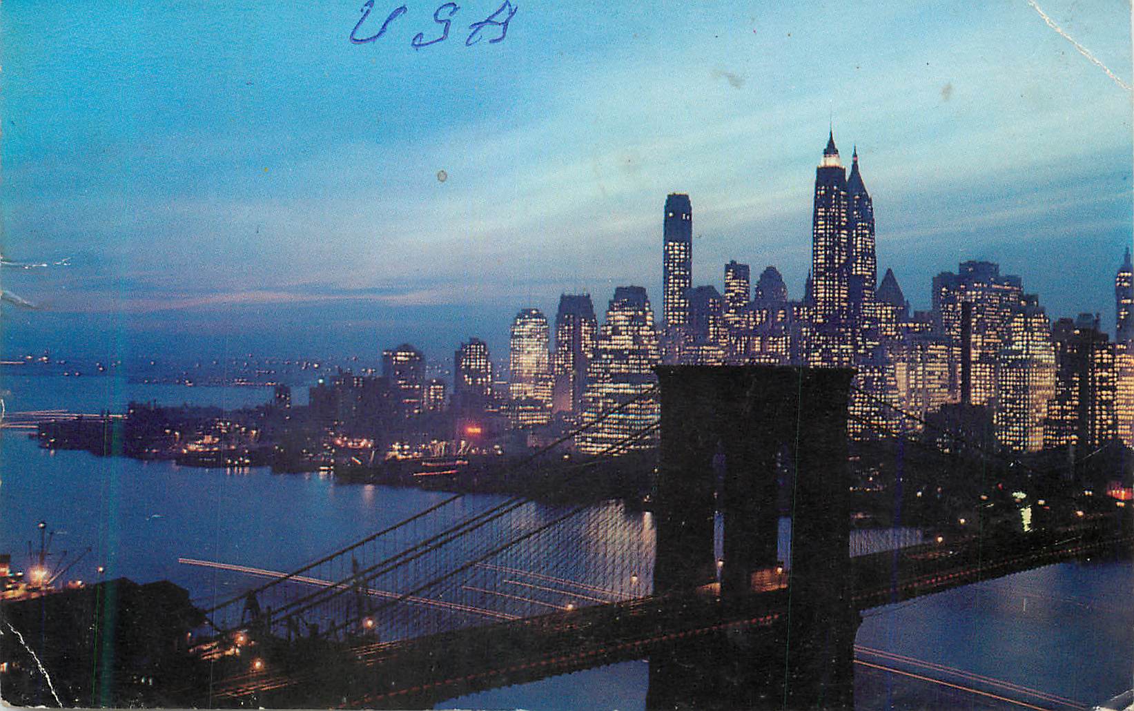 CPM Nightfall in Lower Manhattan with Brooklyn Bridge in New York City