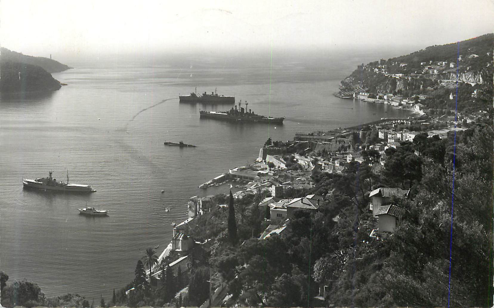 CPM Villefranche sur Mer Soleil couchant sur la ville et l escadre au mouillage Bateaux