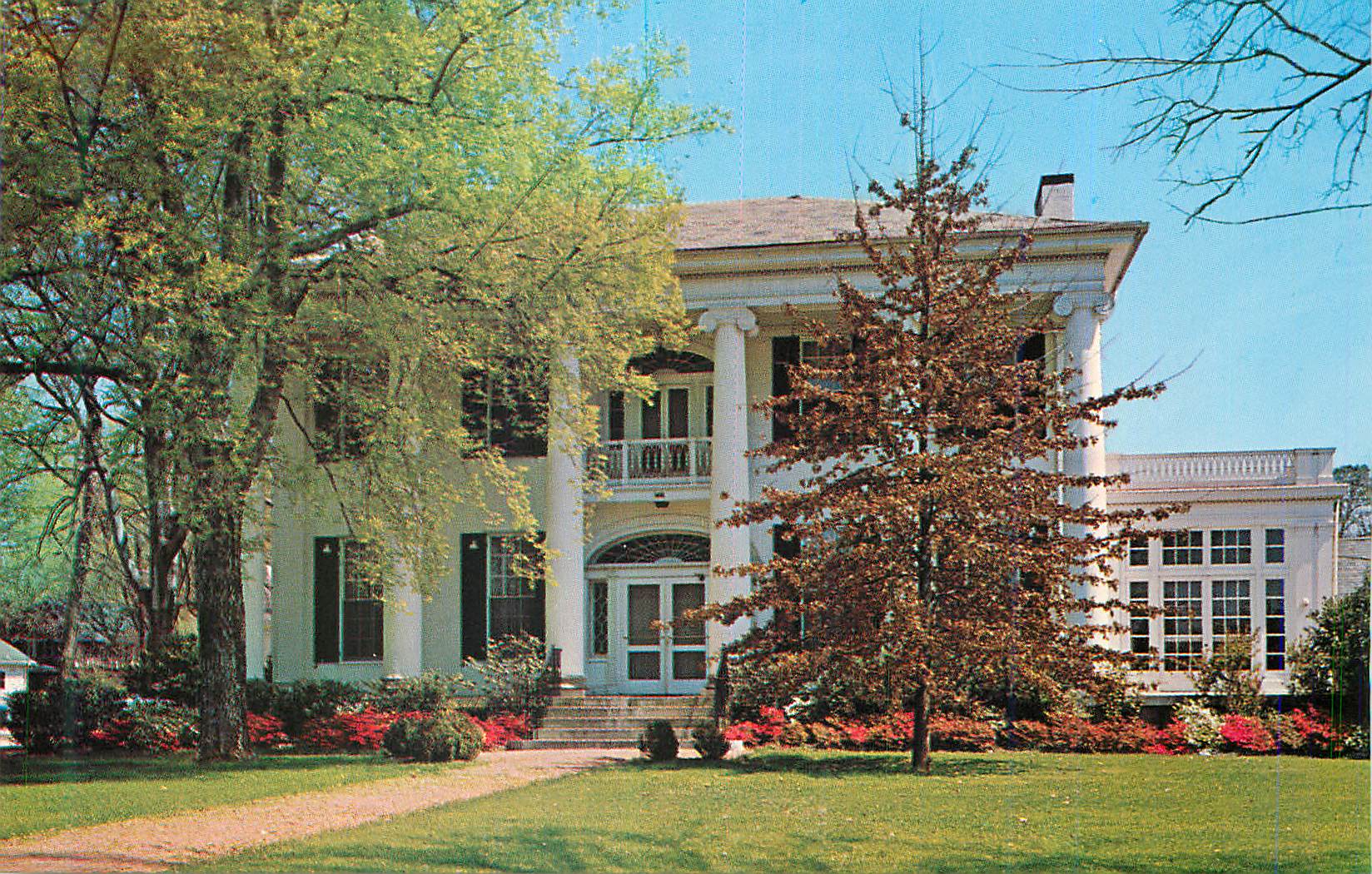 CPM Brilliant Azaleas and a Spacious Lawn Frame this Lovely White Columned Southern Mansion