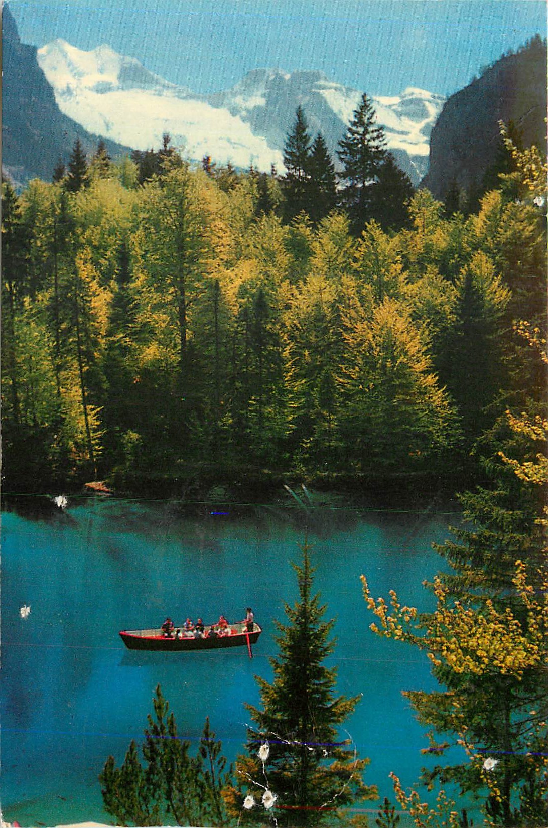 Lac de l'Étang — vue panoramique avec montagnes enneigées — éditeur non visible