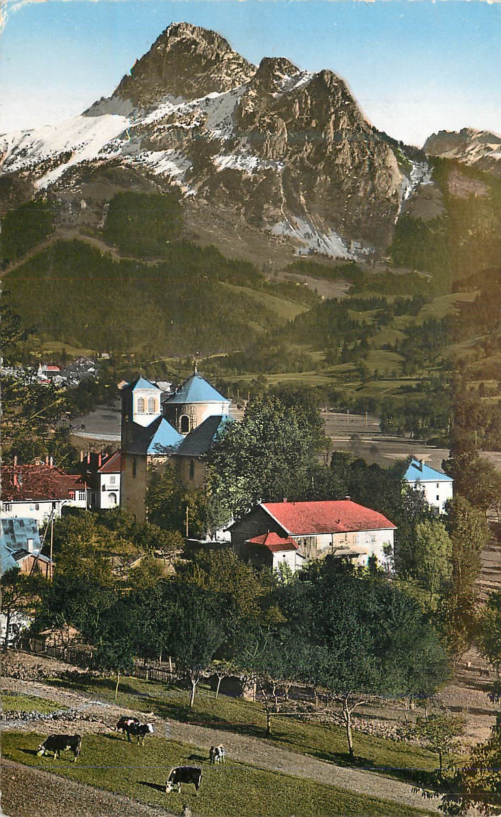 Snowy mountain — village with blue-roofed church — unidentified publisher