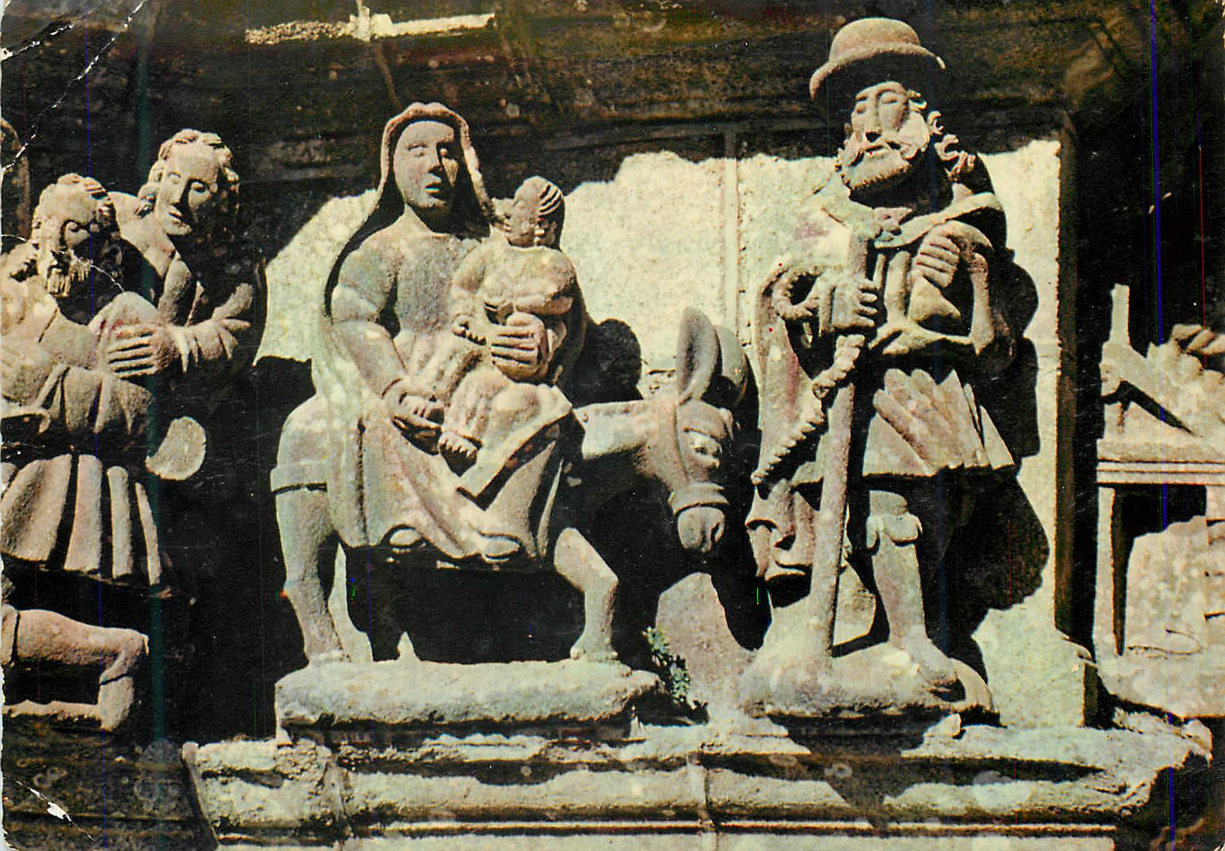 CPM Guimiliau (Finistere) La Bretagne en Couleurs Detail de Calvaire La Fuite en Egypte