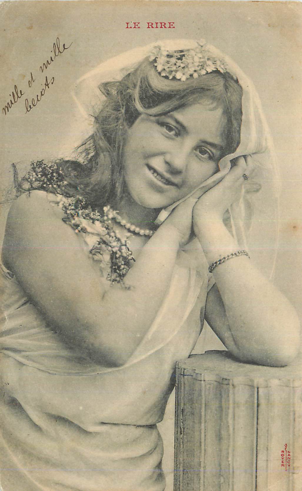 Jeune femme en robe de mariée — Le Rire — éditeur Zérod