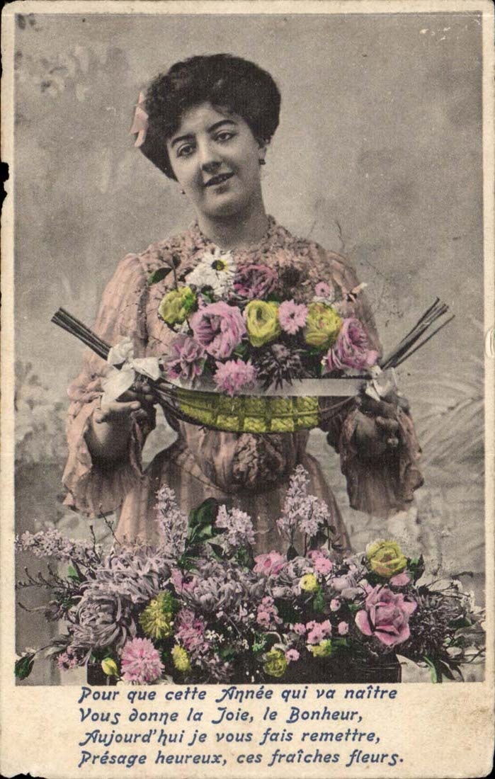 Femme tenant un panier de fleurs — Année qui va naître — Éditeur A. Bucciès, Paris
