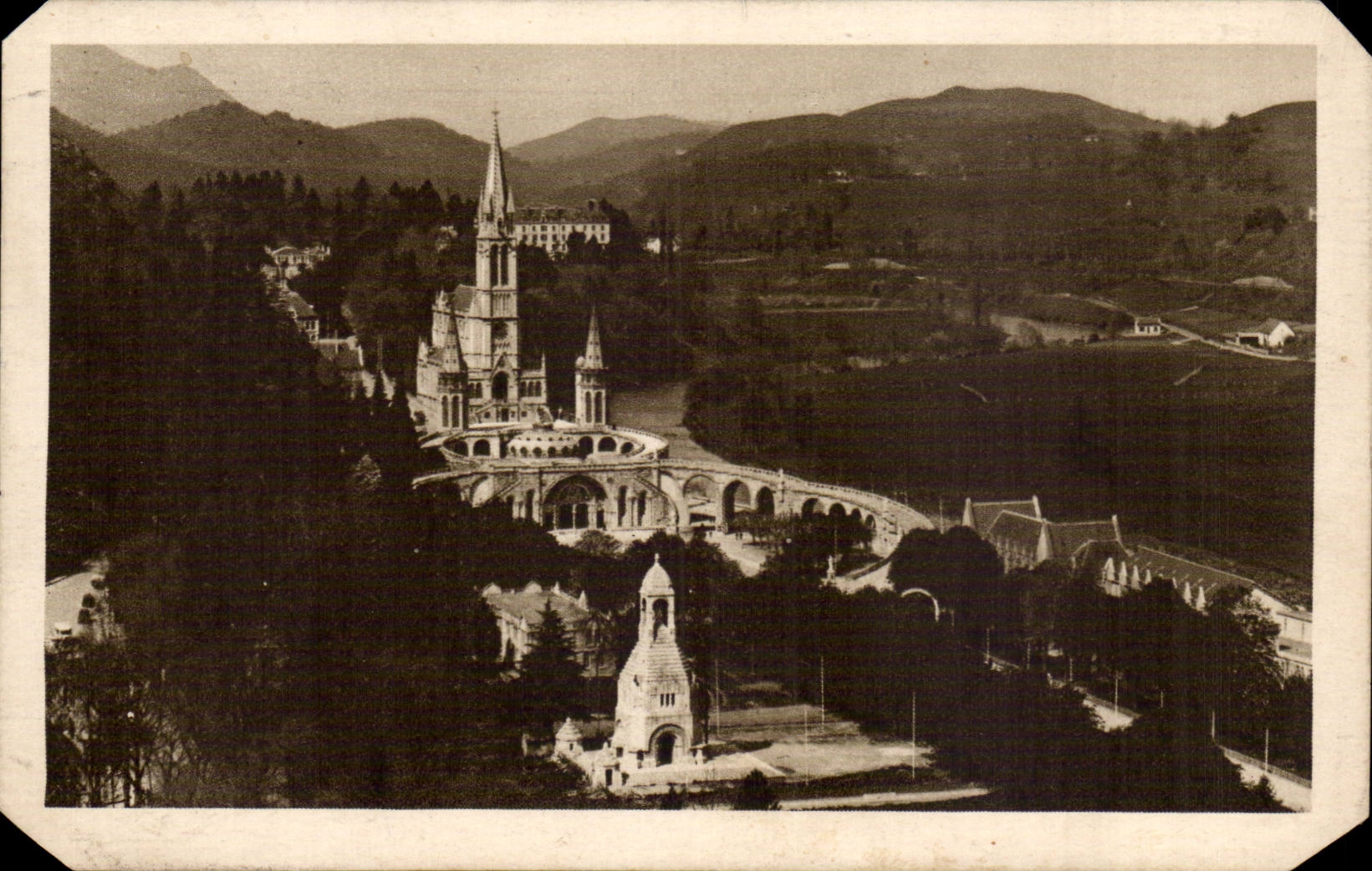 Lourdes CPA La basilique et le monument interallie vus du chateau fort