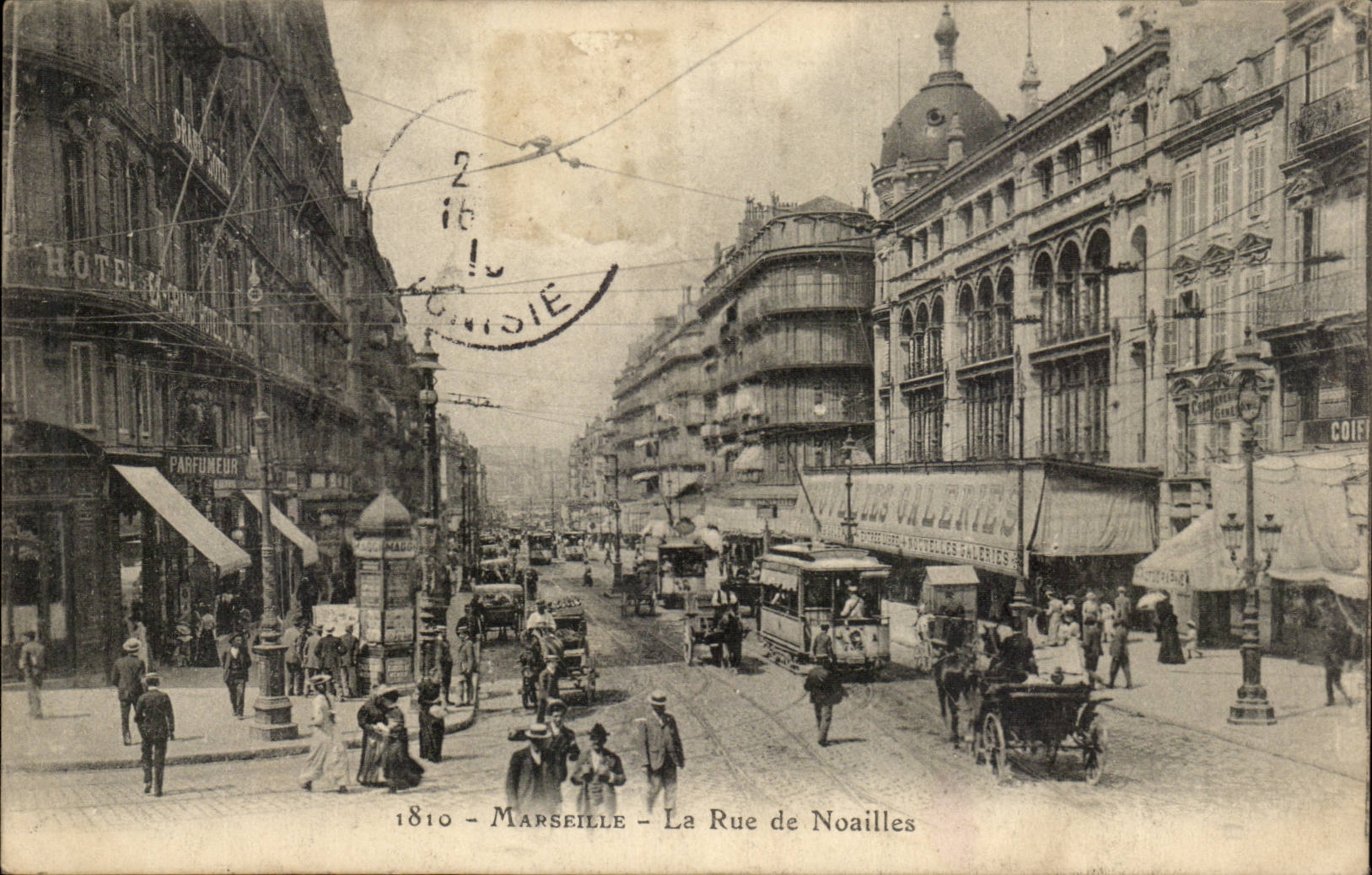 Marseille - La Rue de Noailles — vue animée avec tramway et commerces — éditeur 1810