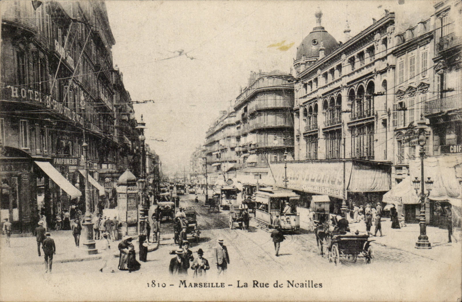 Marseille - La Rue de Ncailles — vue de rue animée avec tramway et commerces — éditeur 1810