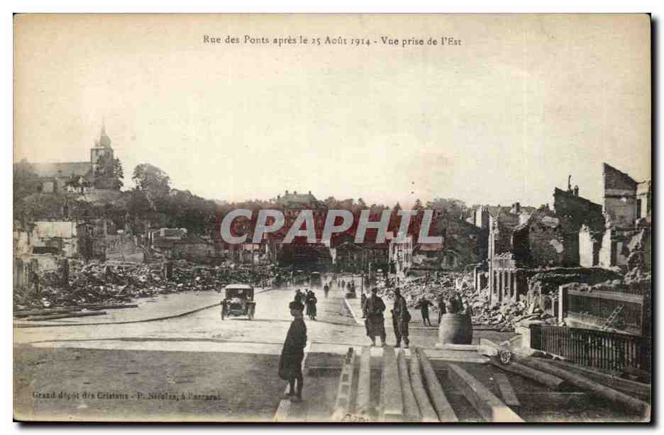 Rue des Ponts après le 25 Août 1914 — Vue prise de l'Est — Grand dépôt des Cristiens, P. Nicolas, à Perrares