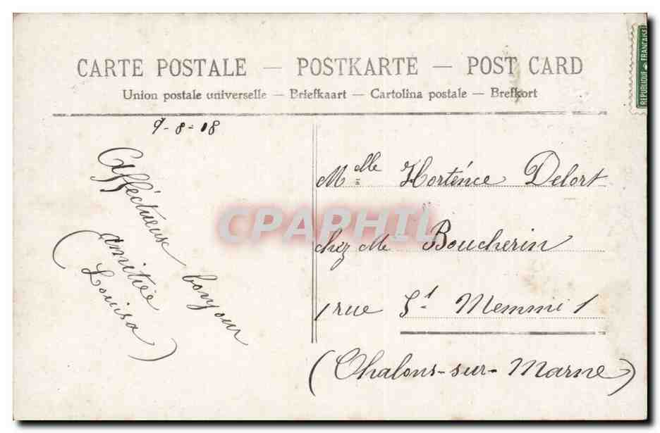 Una donna sorridente in un cornice floreale — 'Un Bacio' — editore anonimo, n. 456 — Verso