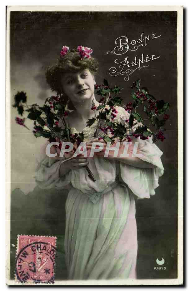 Jeune femme en robe claire tenant un bouquet — Bonne Année — Paris