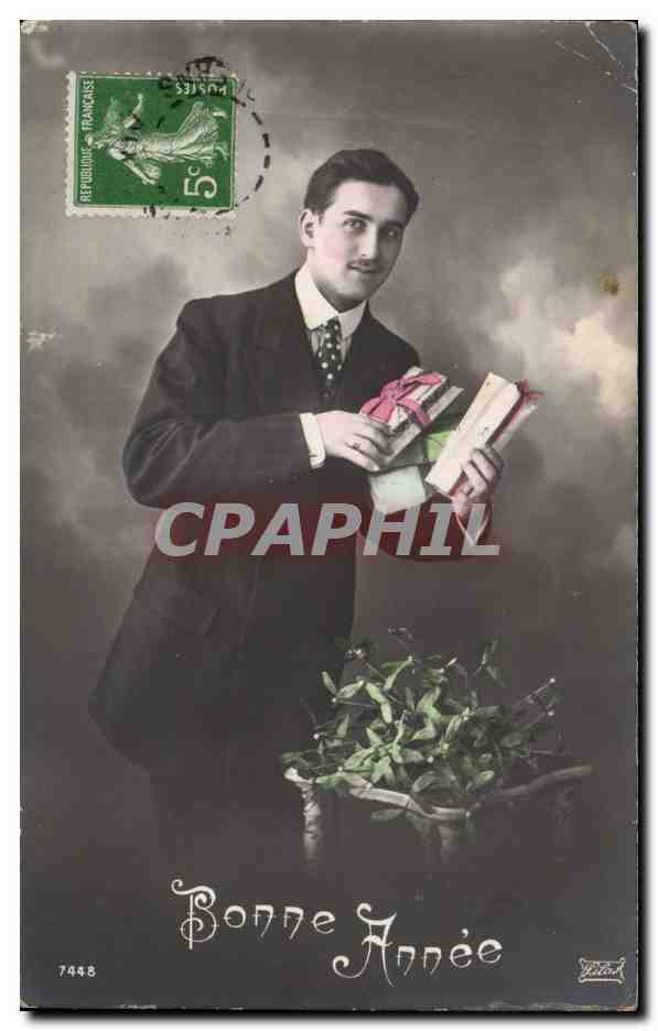 Jeune homme avec cadeaux — Bonne Année — J.C. Paris n°7448