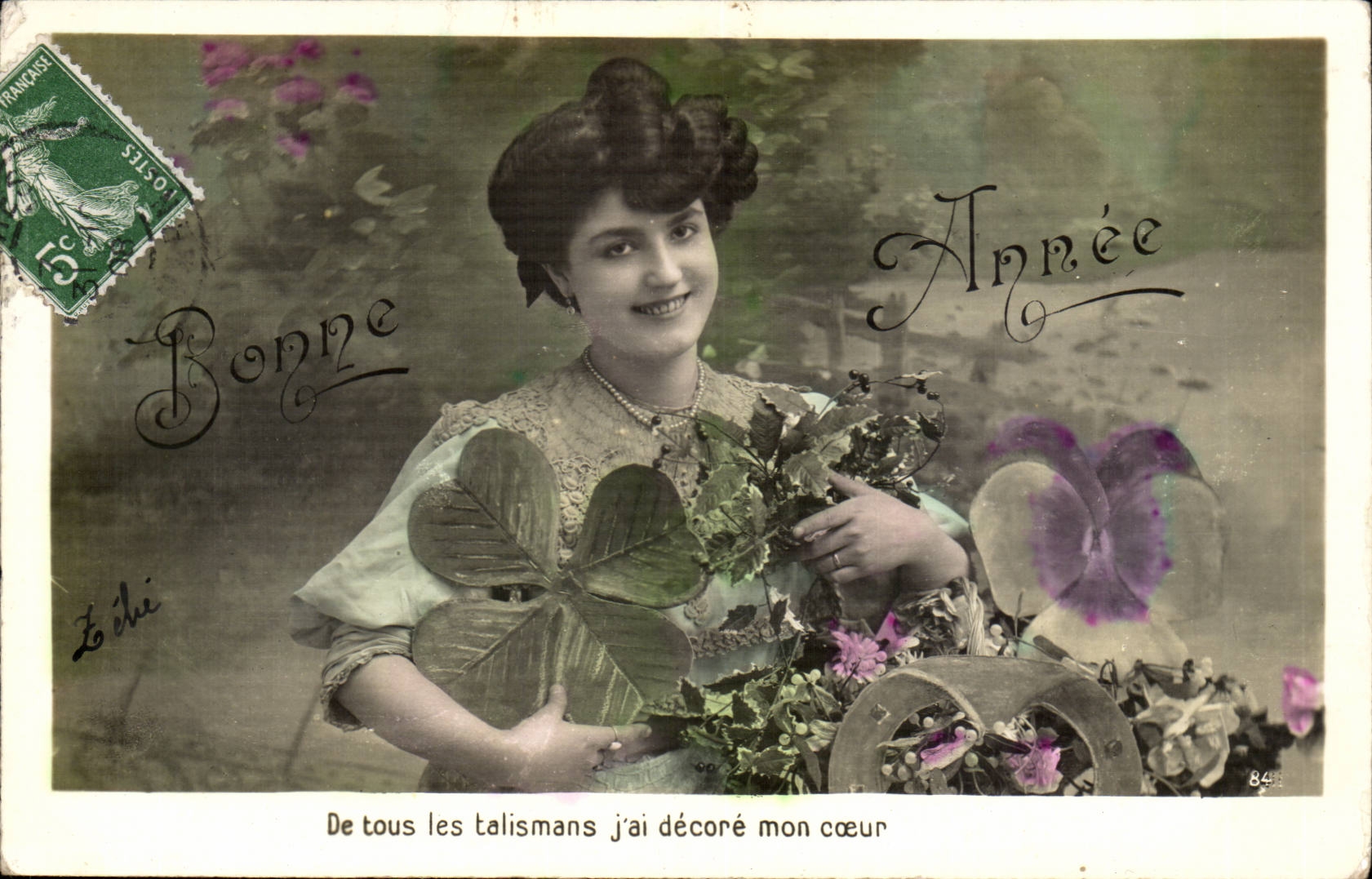 Femme tenant un trèfle à quatre feuilles — Bonne Année — éditeur Lélie, n°84