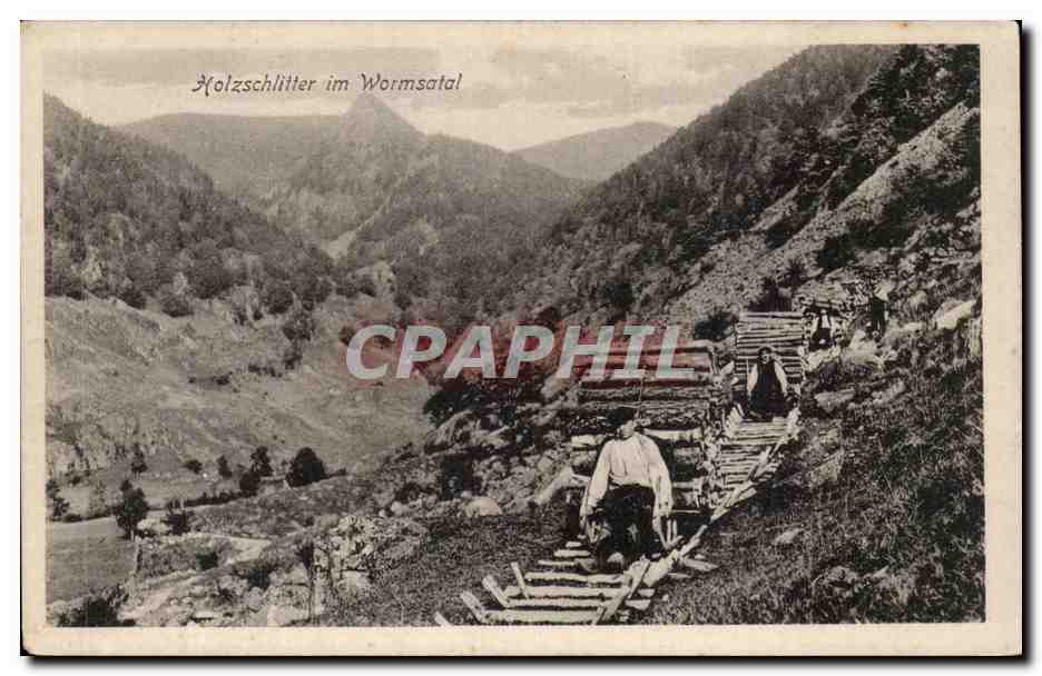 Holzschlitter im Wormsatal — vue de travailleurs sur un sentier en bois dans un vallon montagneux